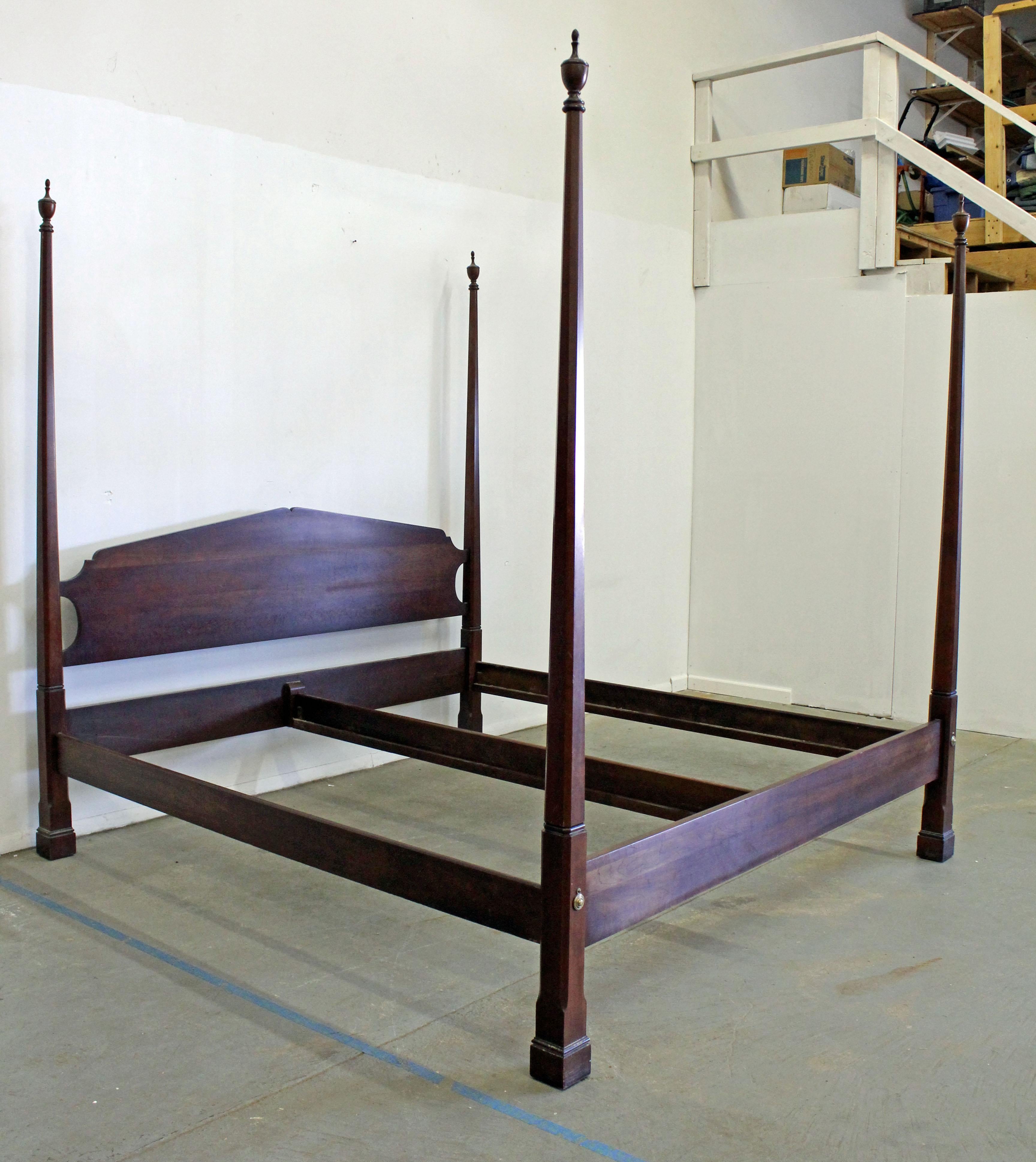 Offered is a vintage Chippendale king size bed frame made of cherry by Statton 'Old Towne'. Includes headboard, footboard, and slats. In good condition with some age wear (structurally sound, some surface scratches or wear, age wear). This piece