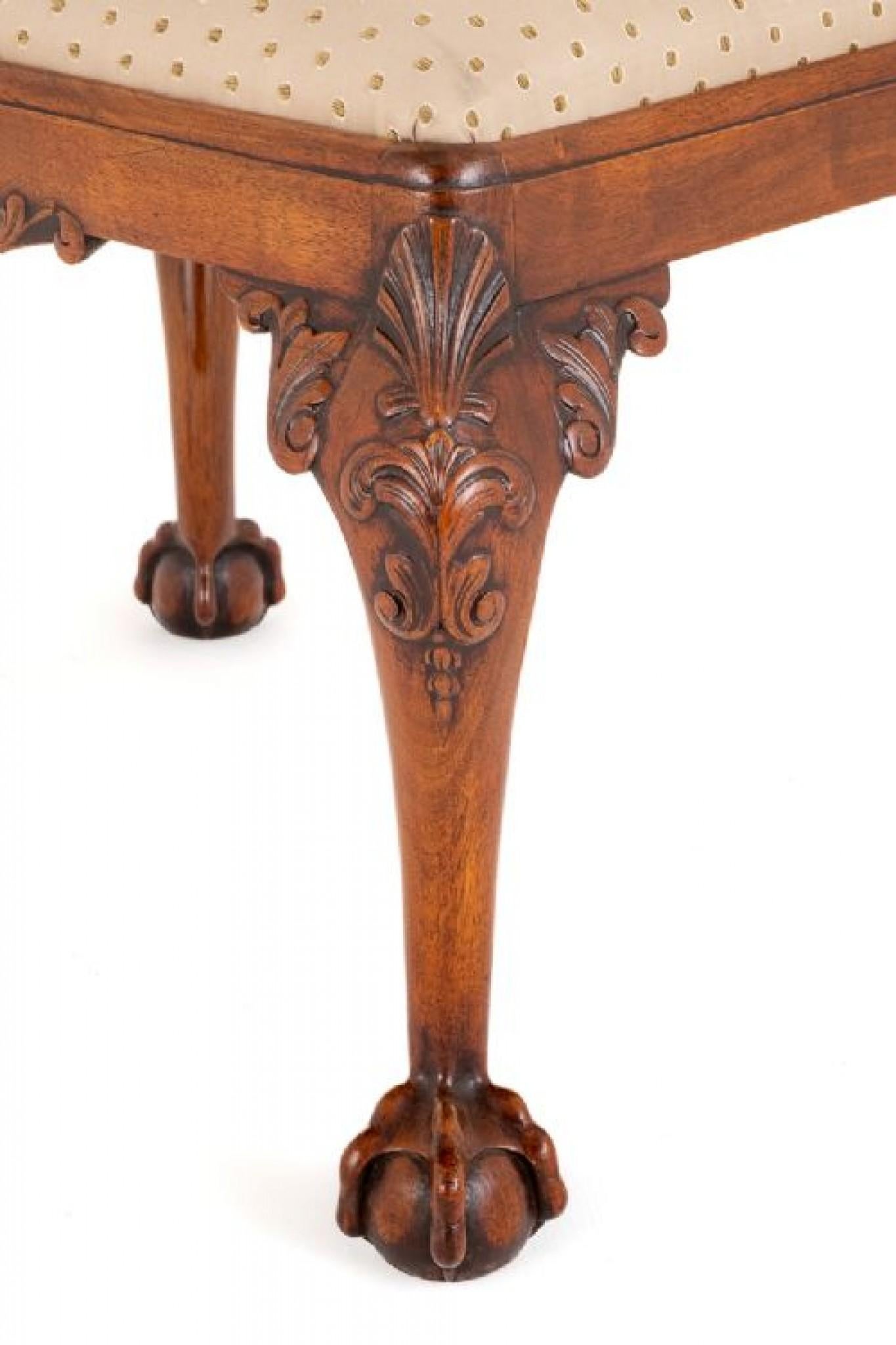 Mahogany stool in the style of Thomas Chippendale.
circa 1920
This stool stands upon cabriole legs with boldly carved ball and claw feet.
The knees also having quality carvings.
The stool has recently been re upholstered and is presented in good