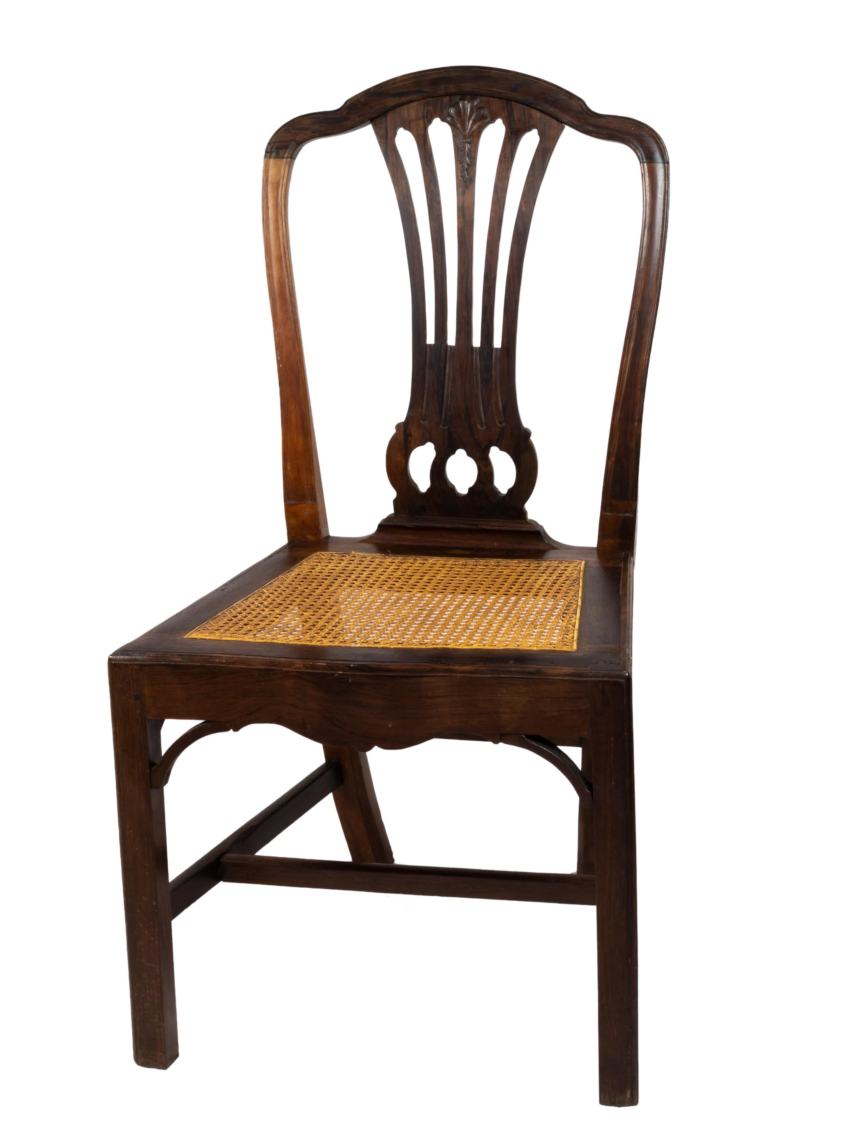 A portuguese chair in the shape of a classic amphora on the back, hollow back and seat of impeccable natural straw, rounded neck at the ends and front and rear legs of rectangular section, with oriental elements combined with neo-Gothic elements,