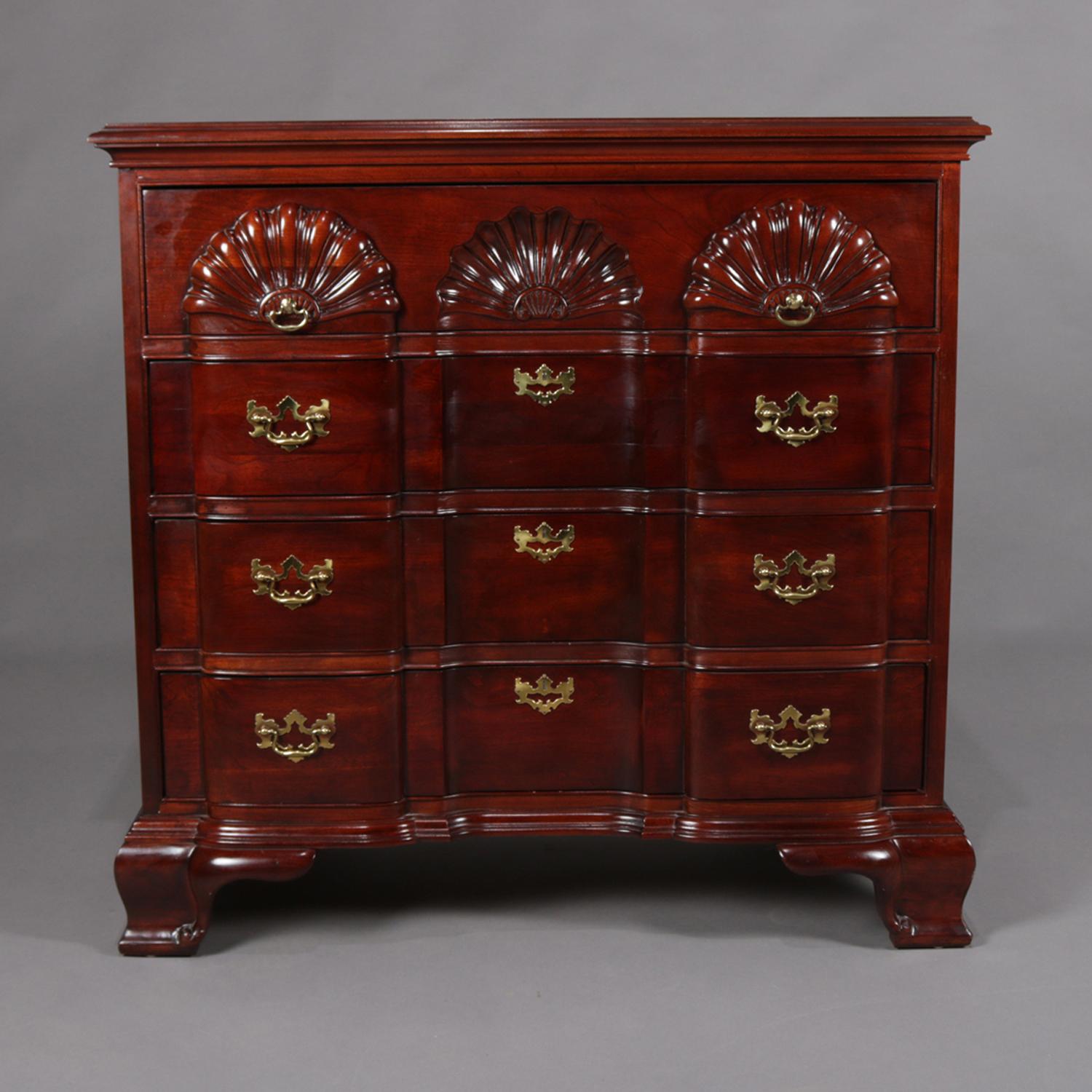 Chippendale style mahogany dresser features block front design with four long drawers, the top drawer having convex flanked by concave carved shell designs, seated on bracket feet and having brass pulls, original Lineage label plaque on drawer