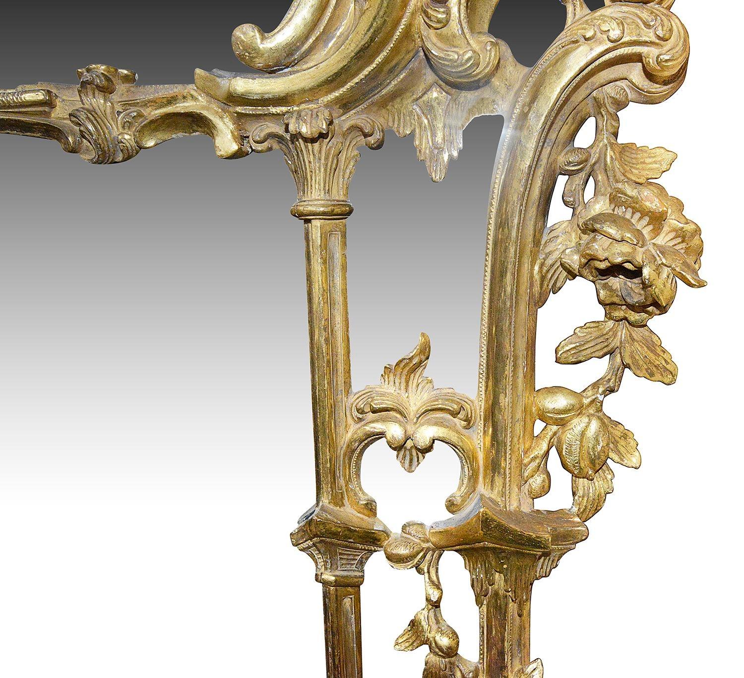 English Chippendale style carved gilt wood pier glass wall mirror, circa 1860 For Sale