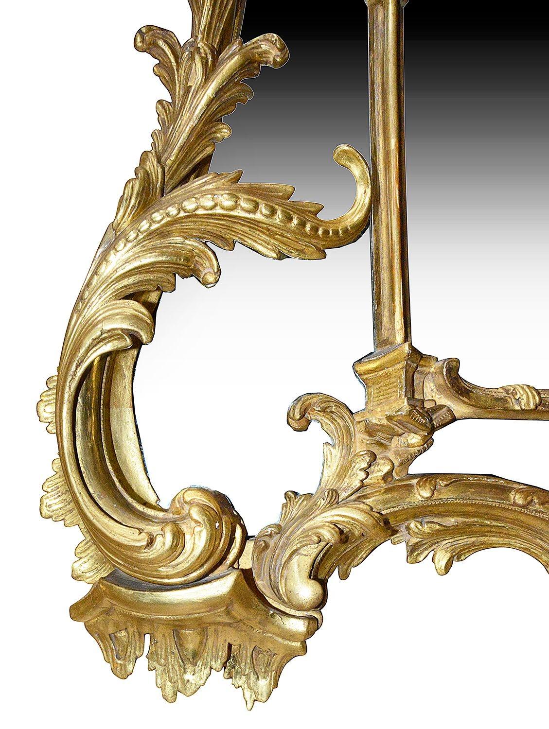Hand-Carved Chippendale style carved gilt wood pier glass wall mirror, circa 1860 For Sale