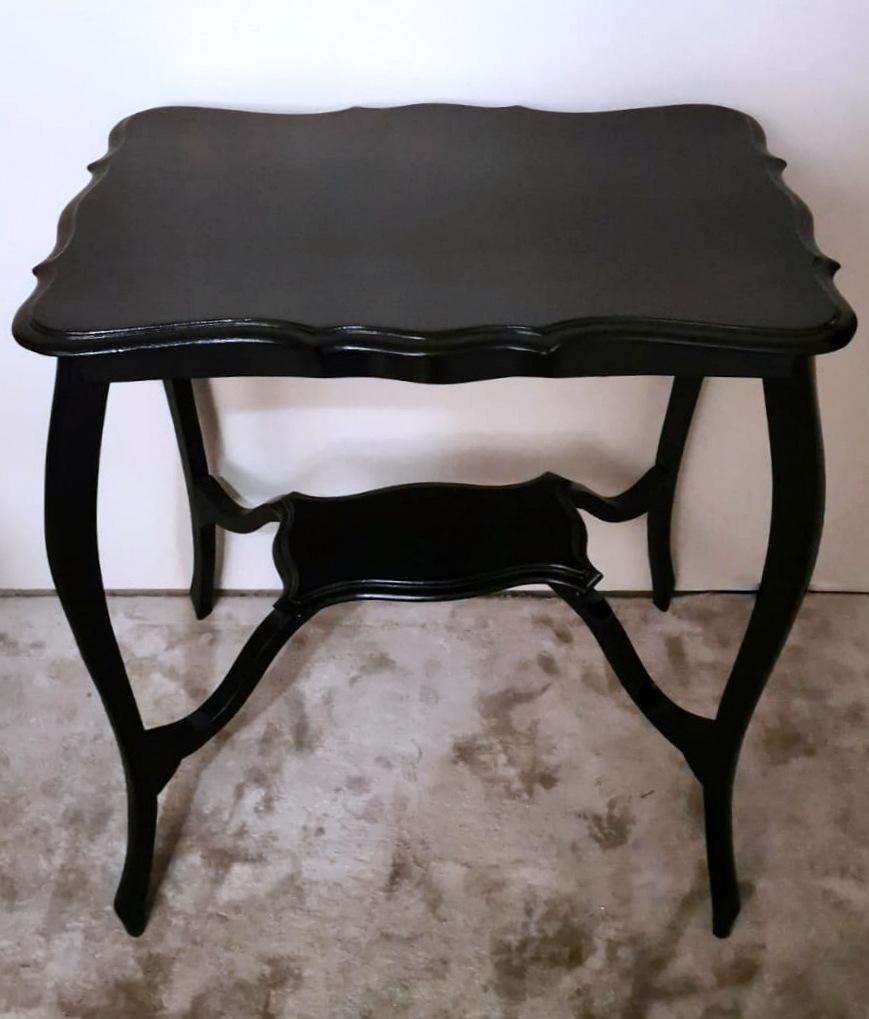 We kindly suggest that you read the whole description, as with it we try to give you detailed technical and historical information to ensure the authenticity of our objects. 
The peculiar and elegant Chippendale coffee table is made of ebonized