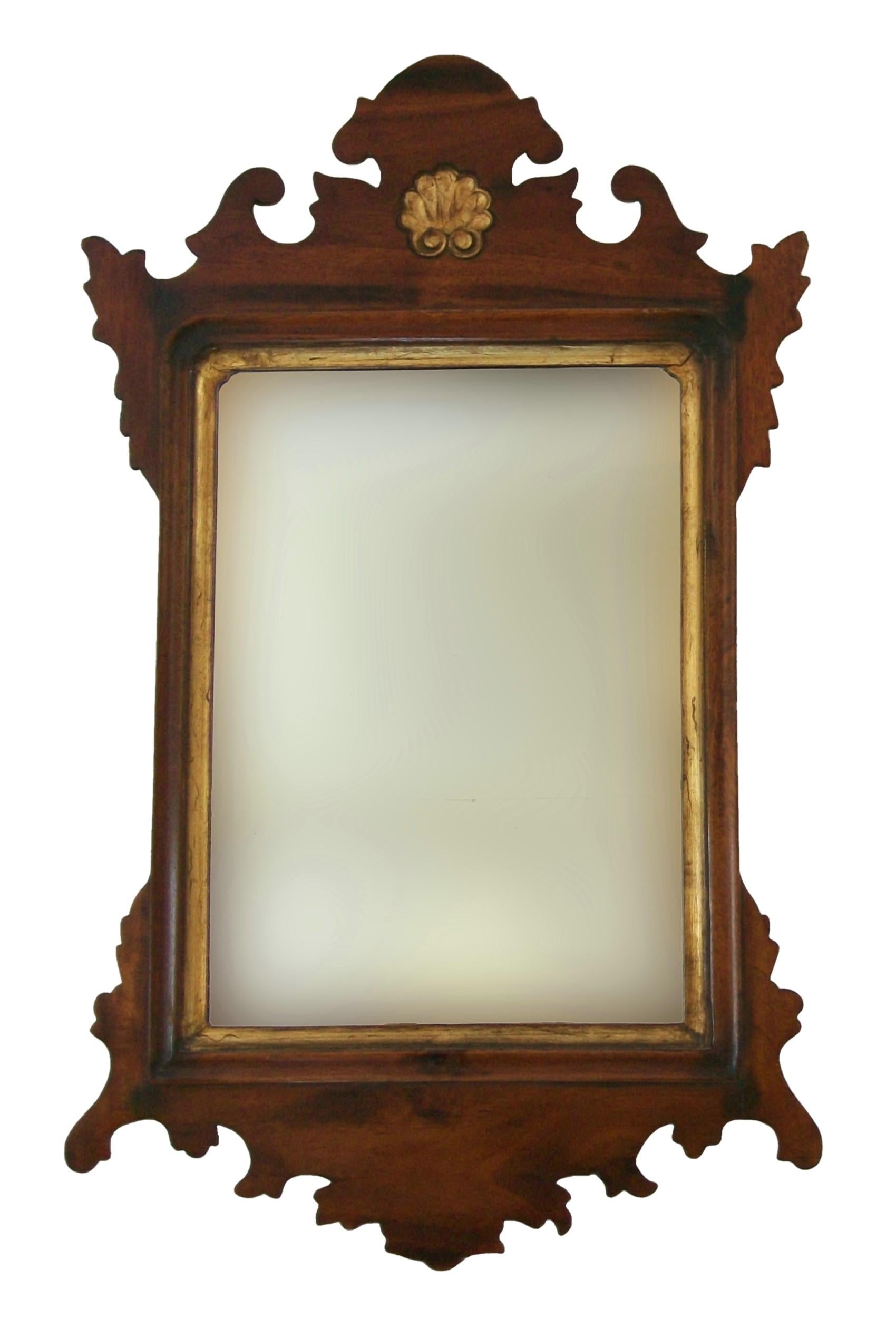 Fine flamed mahogany and parcel gilt diminutive Chippendale style mirror - exceptional quality and warm patina - featuring solid hand carved flamed mahogany panels to the top and bottom (see rear detail photos) - hand carved gilt decorated shell and