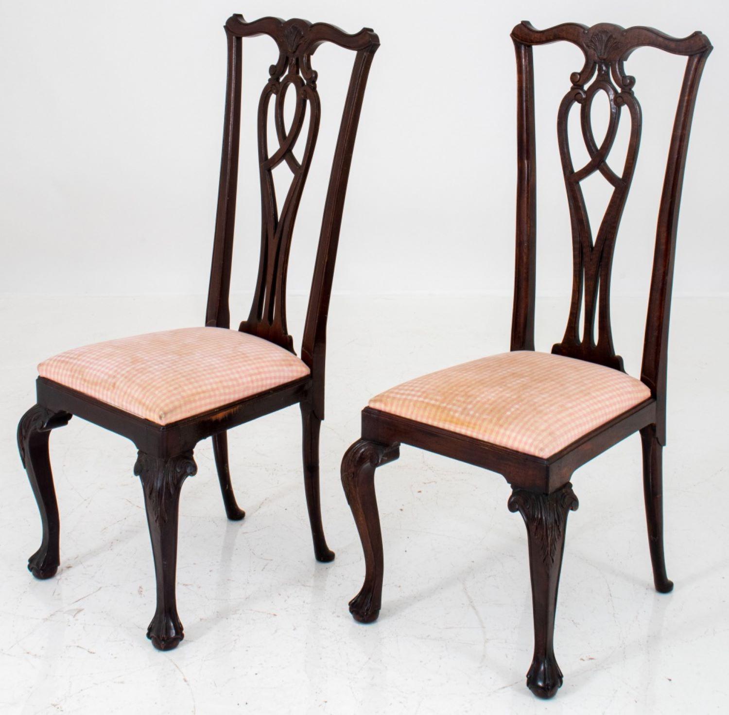 Chippendale style pair of high back mahogany side chairs, two (2). each woth shaped crestrails carved with acanthus above reticulated vasiform splats, the shaped rectangular seats above a plain seatrail on acanthus-kneed cabriole legs terminating in