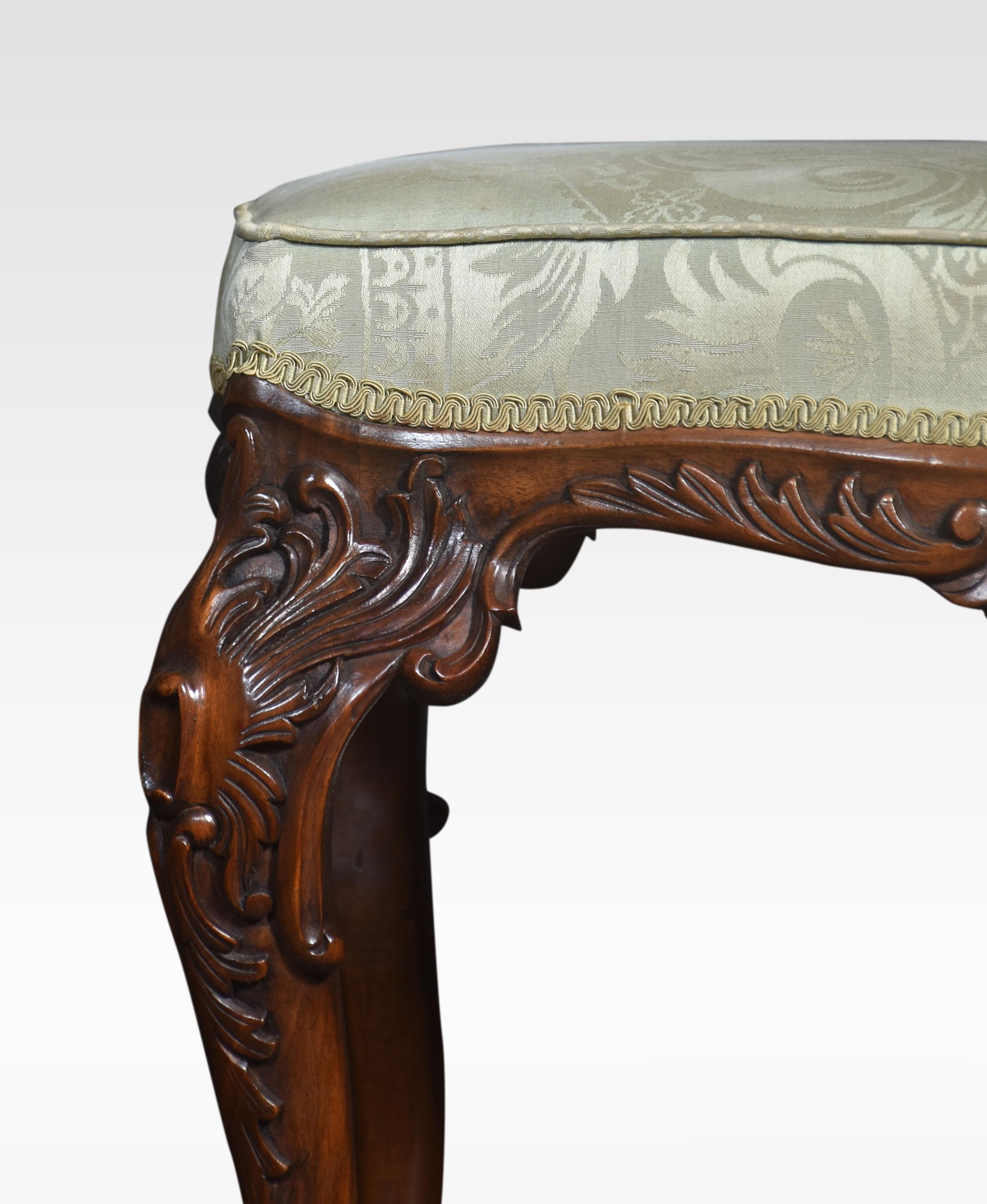 Chippendale style mahogany framed stool, the upholstered seat which is in serviceable condition, to the carved moulded freeze raised up on four crisply carved cabriole supports terminating in claw and ball feet.
Dimensions
Height 20 Inches
Width 24