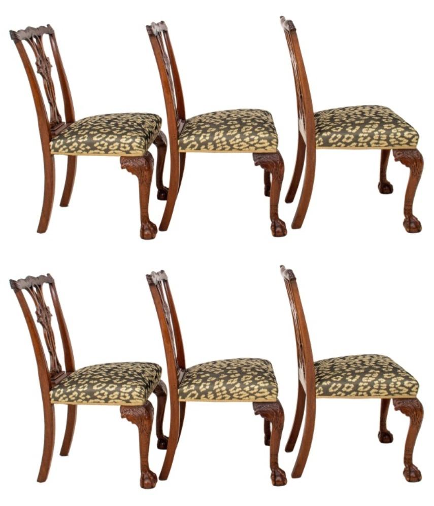Chippendale style mahogany side chairs, likely ca. 1900 with scrolling shaped crest rail above a reticulated eagle head back splat on shaped rectangular seat above eagle-carved cabriole legs terminating in claw and ball feet. 37