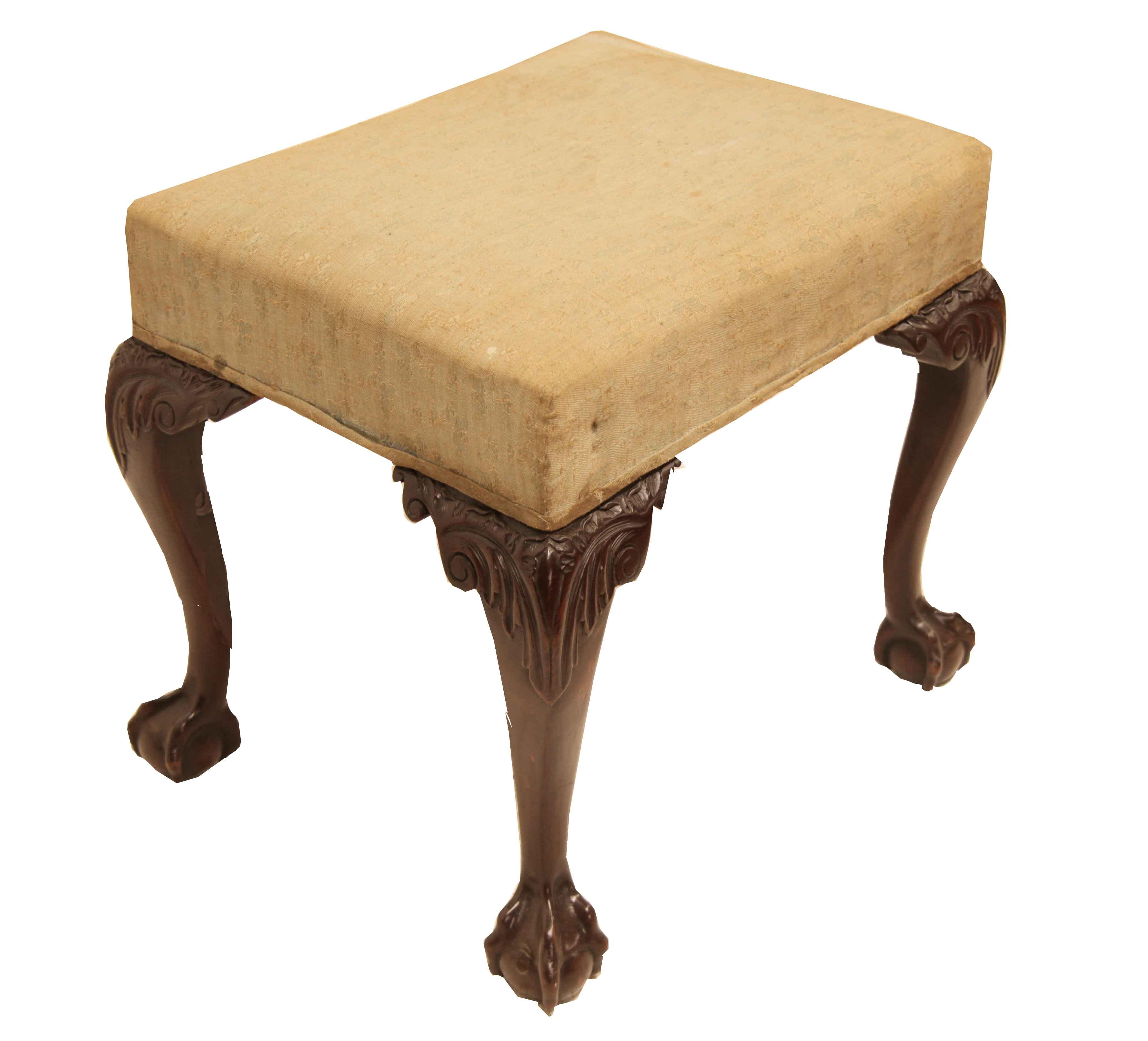 Chippendale style stool , the seat appears to have the original upholstery (needs changing).  The mahogany legs have a nice cabriole shape with carved acanthus knee terminating with a well developed ball and claw foot.