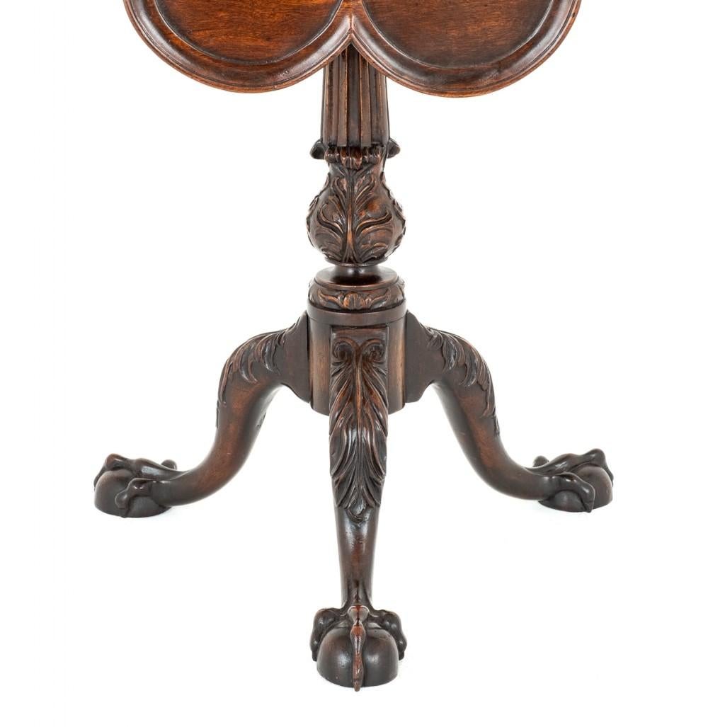 Chippendale Style Mahogany Supper Table.
Circa 1900
This Table Stands Upon Shaped Legs with Carved Knees and Boldly Carved Ball and Claw Feet.
The Column Being of a Carved Form with a Bird Cage to the Top.
The Shaped Top of the Table Having 8 Plate