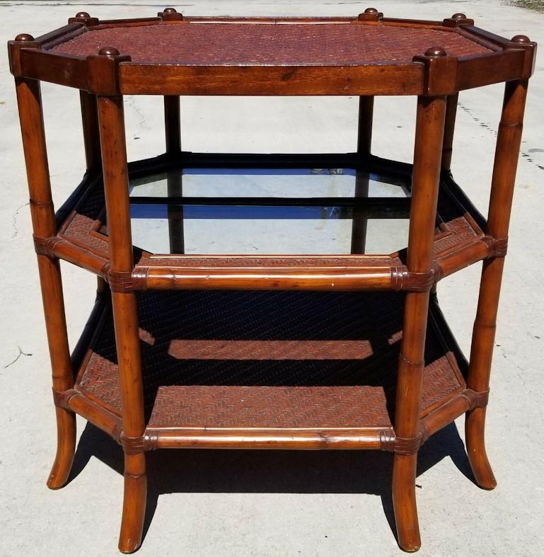 For FULL item description click on CONTINUE READING at the bottom of this page.

Offering One Of Our Recent Palm Beach Estate Fine Furniture Acquisitions Of A 
Chinese Chippendale Style 3 Tier Bamboo, Rattan, Wicker, and Glass Octagonal Occasional
