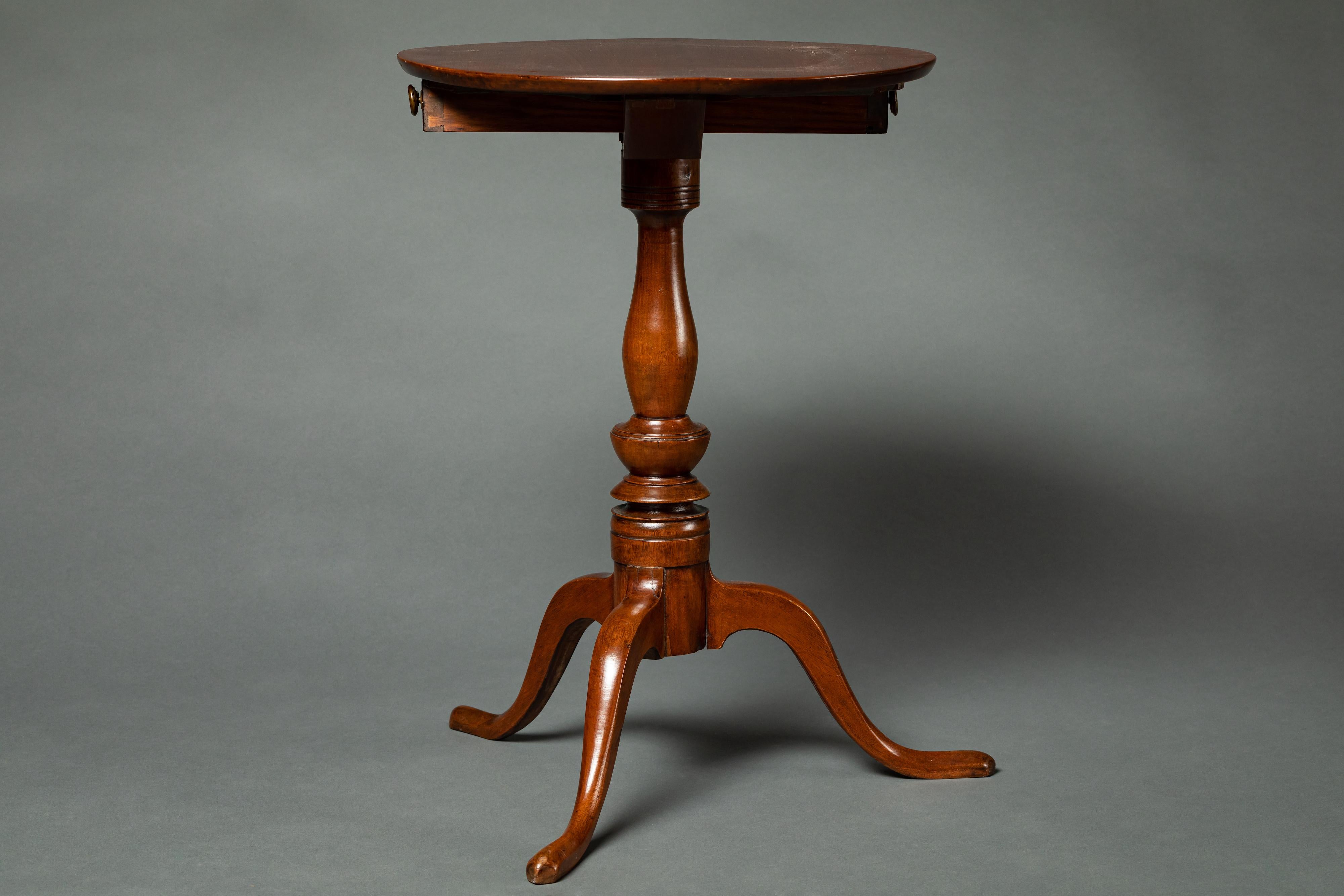 English 18th century side table fitted with a later drawer.