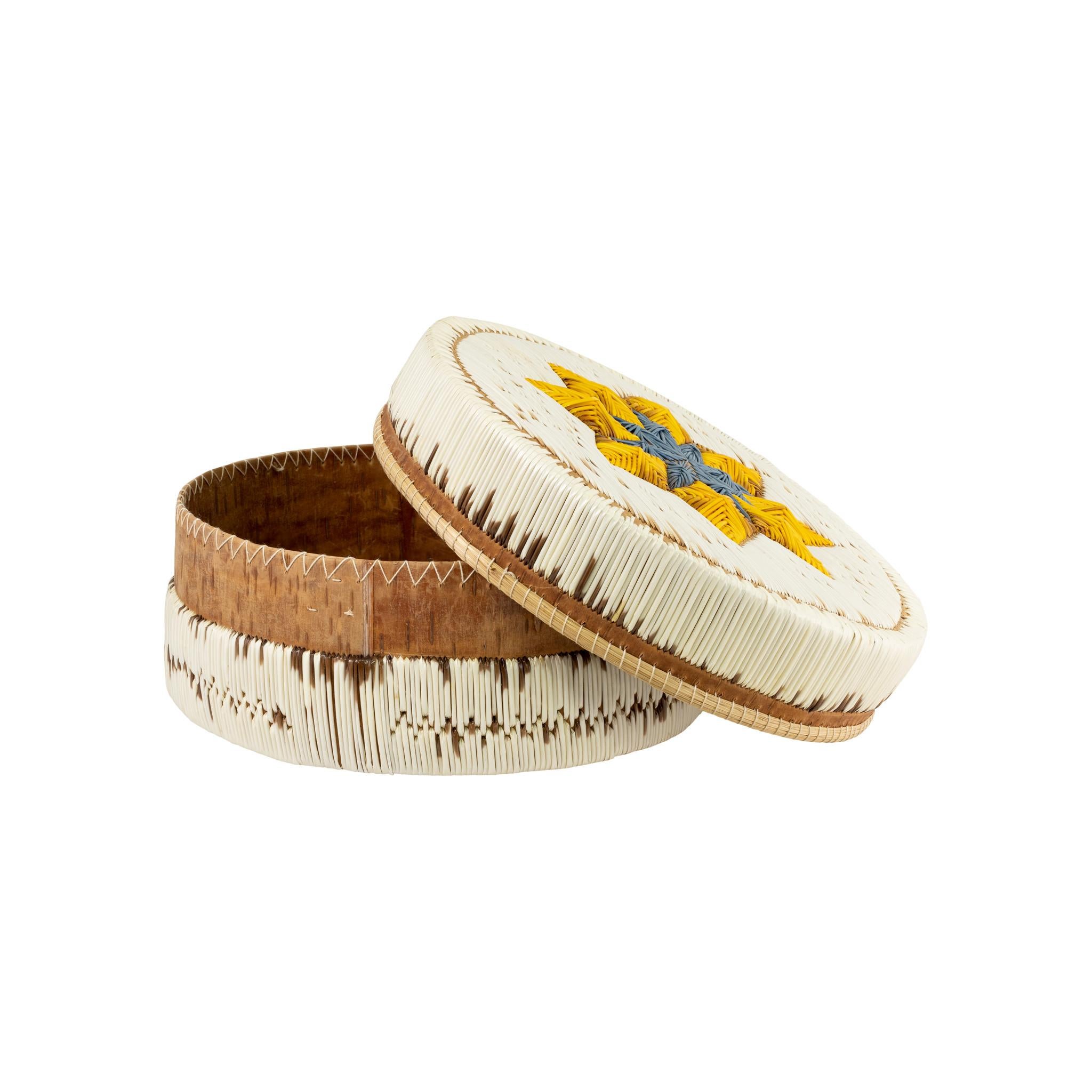 Chippewa circular quilled birch bark box with fully quilled lid with three dimensional yellow star. Birch bark, quills and sweet grass.

Period: Mid-20th century
Origin: Chippewa/Minnesota
Size: 8