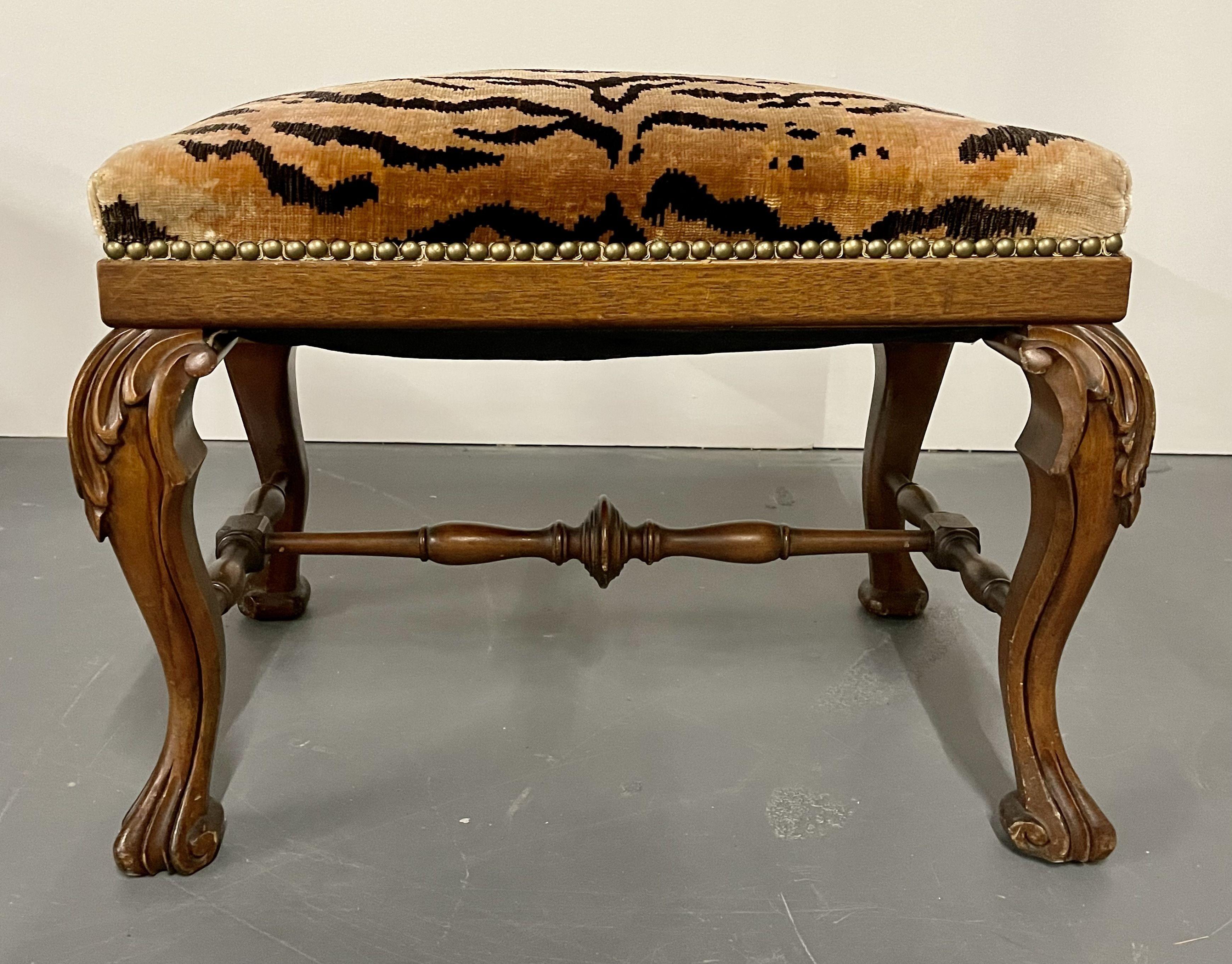Chippindale style leopard upholstered foot stool or bench. Fine carved Claw Feet with Cabriole Legs stands this lovely finely upholstered bench.

Removed directly from Dr. Shawn Garber's home on the Gold Coast of Long Island. Part of an extensive