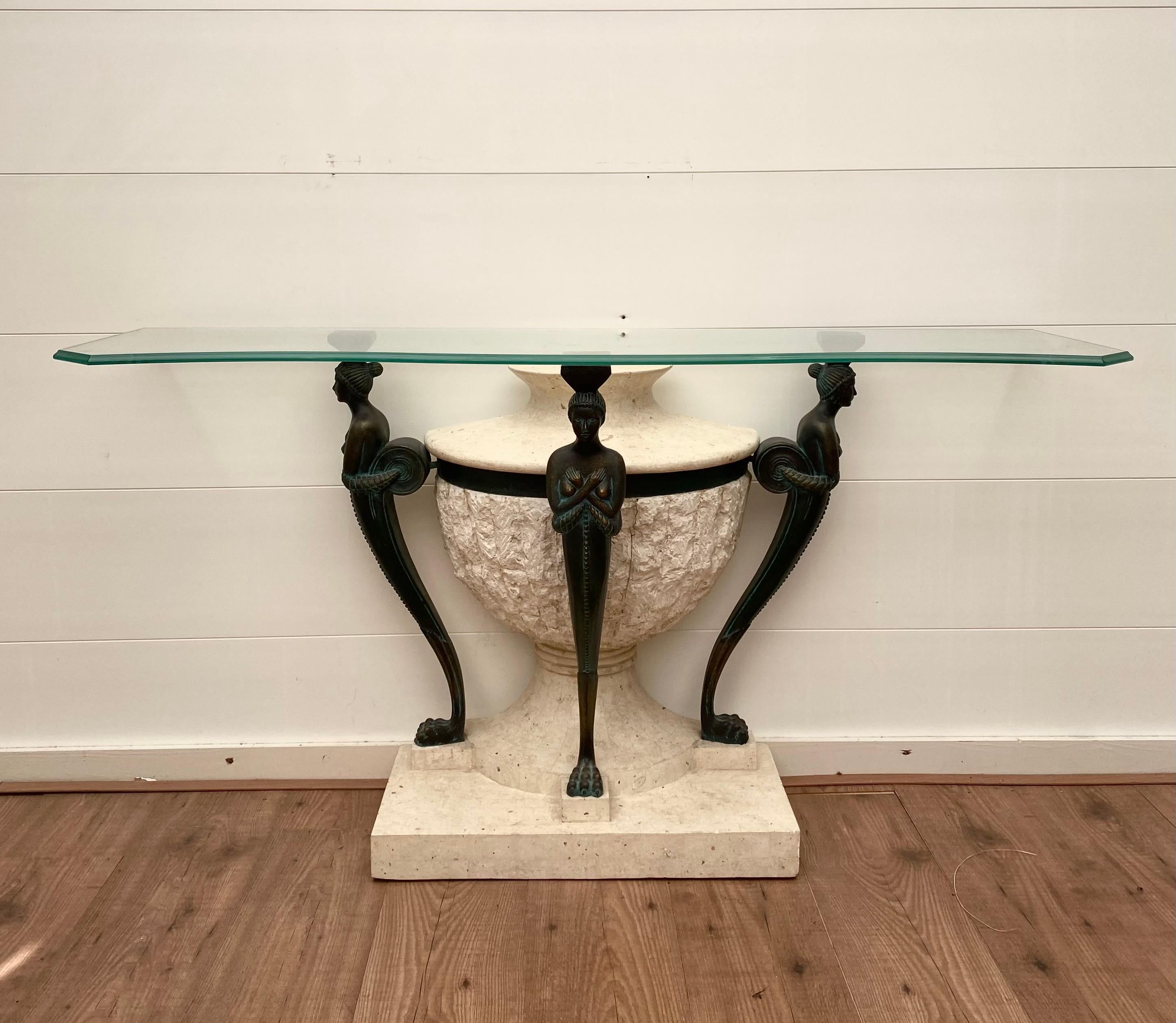 Gorgeous light weight Console table, featuring a cut Tempered glass top and synthetic/ fiber like base in Belgian Hard stone look with Bronze look ornaments. Looks absolutely real! Wear consistent with age and use, see: images. Labeled with a