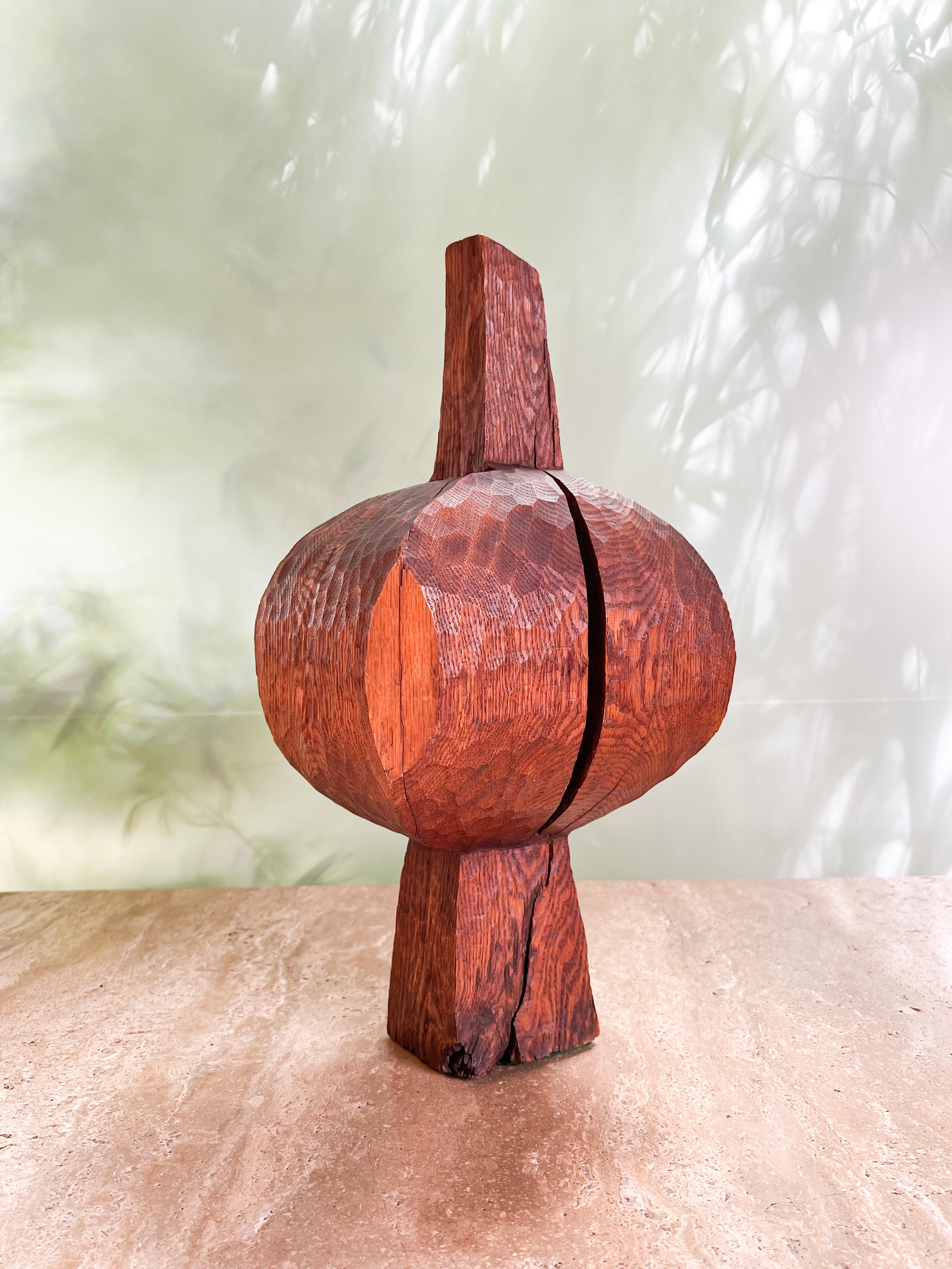 Chiseled and stained oak sculpture by American artist Hugh Townley (1923-2008). The spire shaped, finial form displays the artists lifelong love of wood and the abstracted form. Incised 'TOWNLEY 53'.