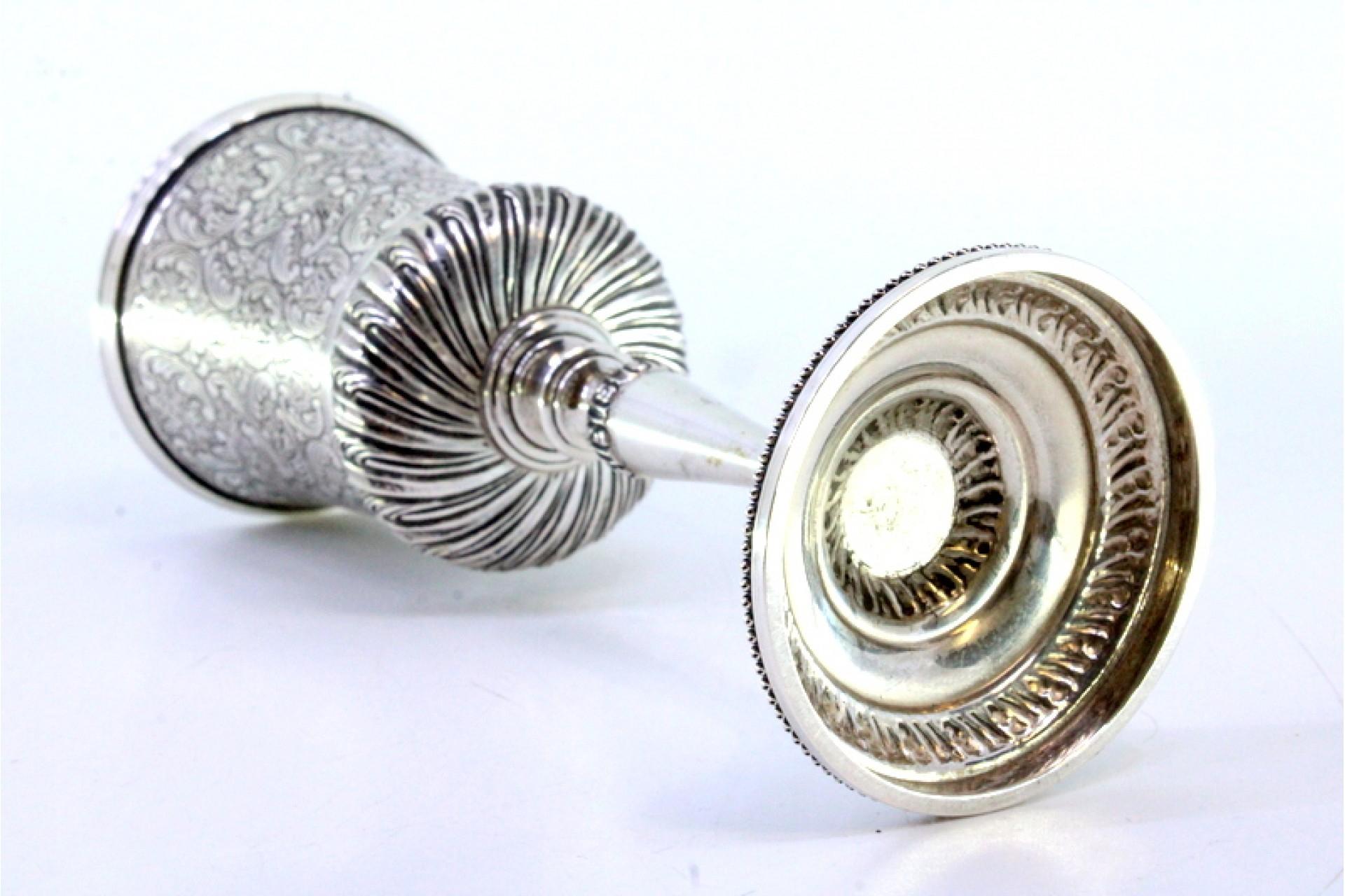 European Chiseled silver chalice with reliefs and pearly-frieze base For Sale