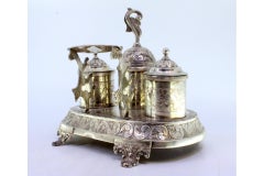 Chiseled silver inkwell with scrolls, acanthus leaves, tanks & bell