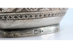 Chiseled silver milk jug with a knob on the hinged lid in the style of D. Maria
