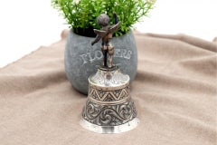 Chiseled silver table bell