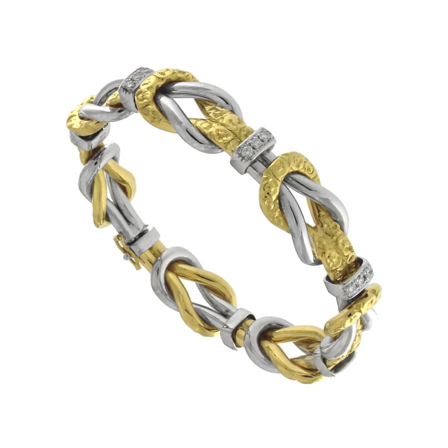 Description
The Chiselled Knot Bracelet is a distinguished piece from the Roserosse collection, showcasing the disappearing art of chiselling. This bracelet combines the timeless appeal of yellow and white gold with the intricate detail of chiselled