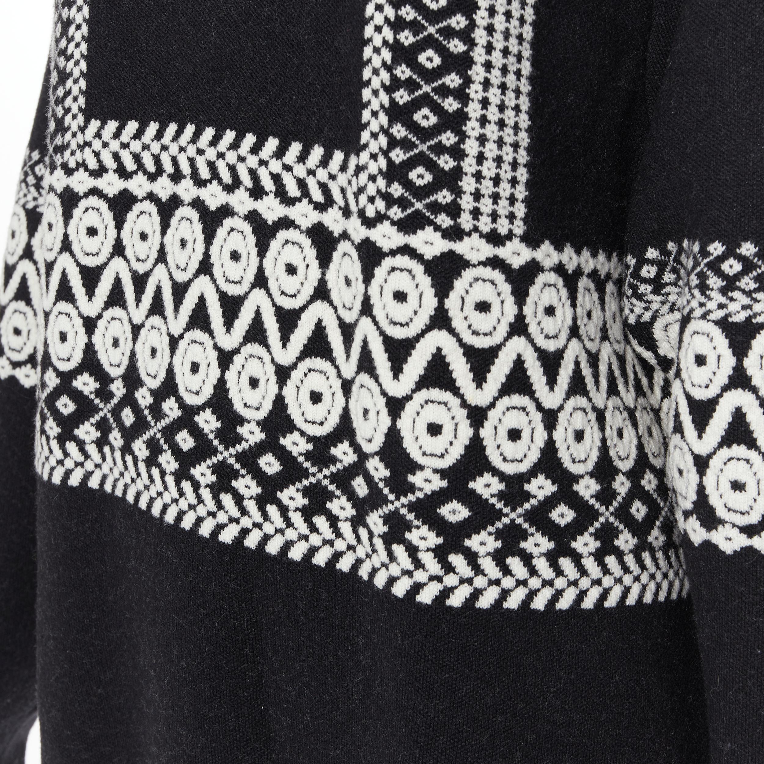 CHLOE 100% wool black white intarsia woven long sleeve sweater pullover XS 
Reference: TGAS/B00737 
Brand: Chloe 
Material: Wool 
Color: Black 
Pattern: Solid 
Extra Detail: Oversized long length fit. 
Made in: Italy 

CONDITION: 
Condition: