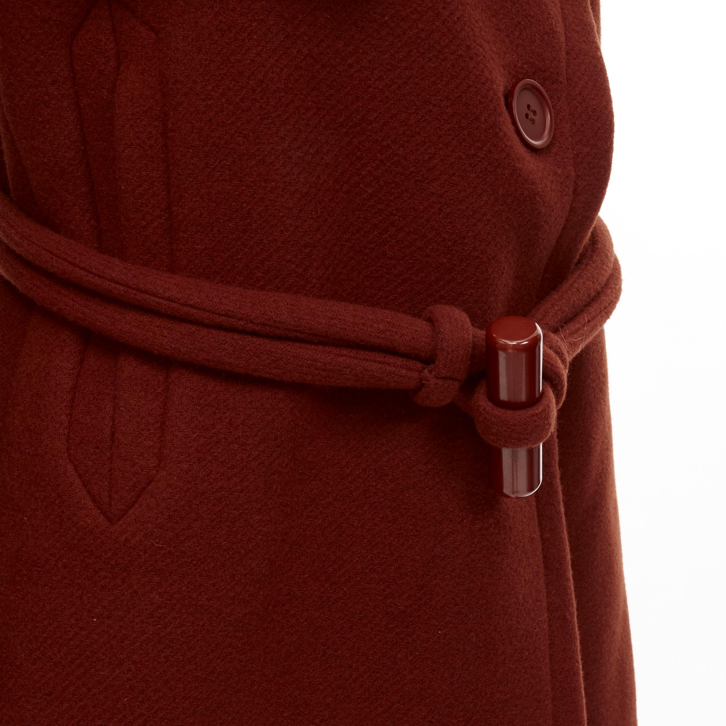 CHLOE 2015 brick red wool toggle belt long coat FR38 M
Brand: Chloe
Collection: Pre Fall 2015 
Material: Wool
Color: Red
Pattern: Solid
Closure: Button
Extra Detail: Pre-Fall 2015 collection. Terracotta red/brown wool fabric. Dual side pockets.