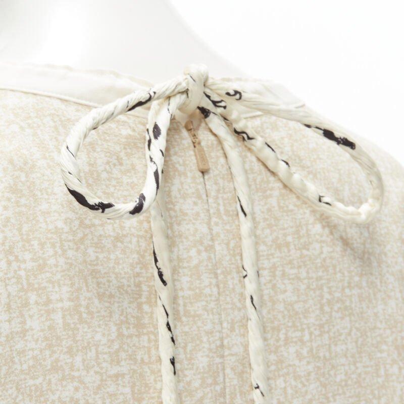 CHLOE 2019 Sandy Khaki speckle bohemian crochet sleeves layered dress FR40 M
Reference: KNLM/A00131
Brand: Chloe
Material: Viscose, Polyester
Color: Beige, Brown
Pattern: Solid
Lining:  Silk
Extra Details: Printed and knotted rope drawstring at back