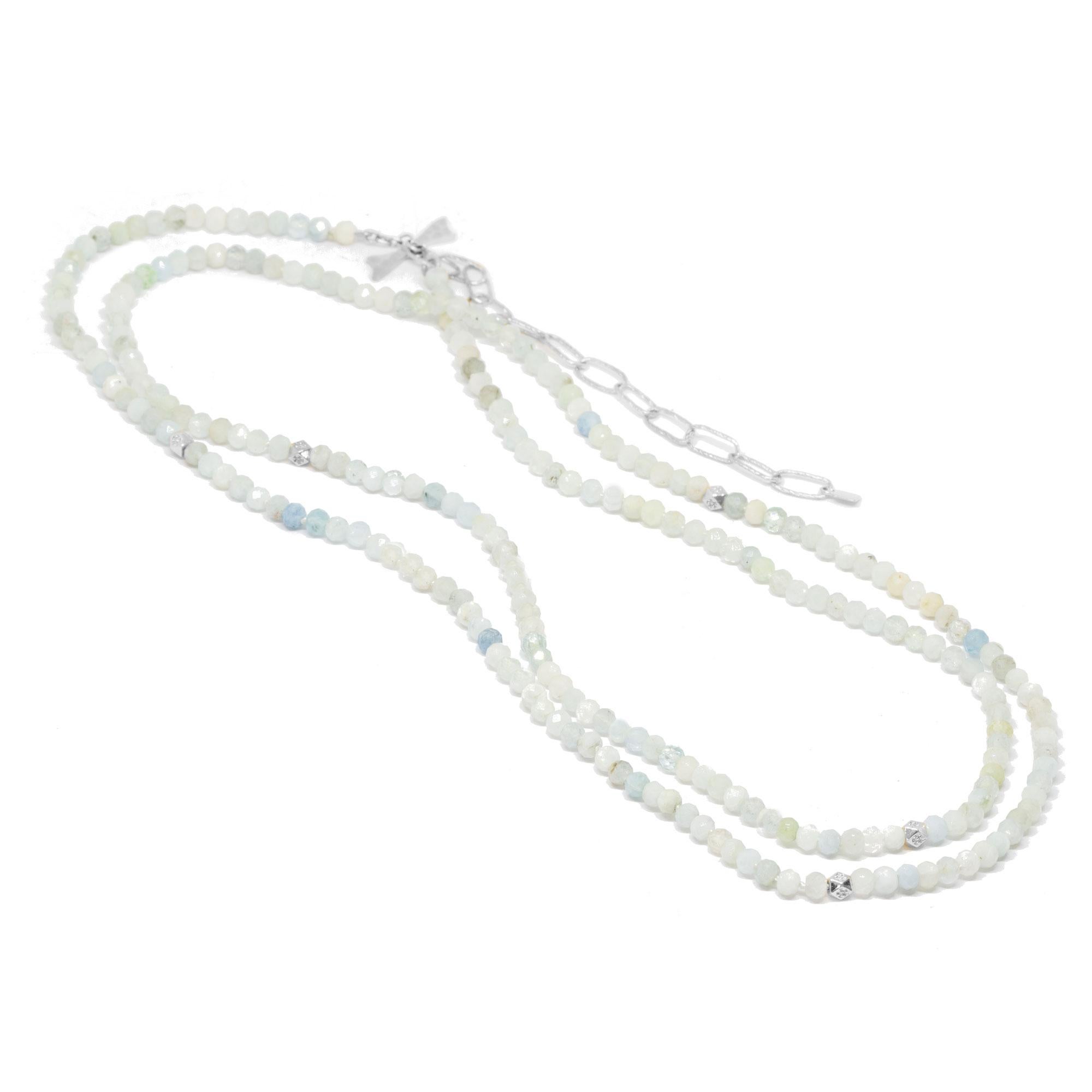 The best part about our Chloe Silver Gemstone Convertable Wrap isn’t just that it can be worn long, doubled-up, or as a wrap bracelet (although that’s pretty cool). It’s that you can thread any of our Charms onto the aquamarine beads—have fun