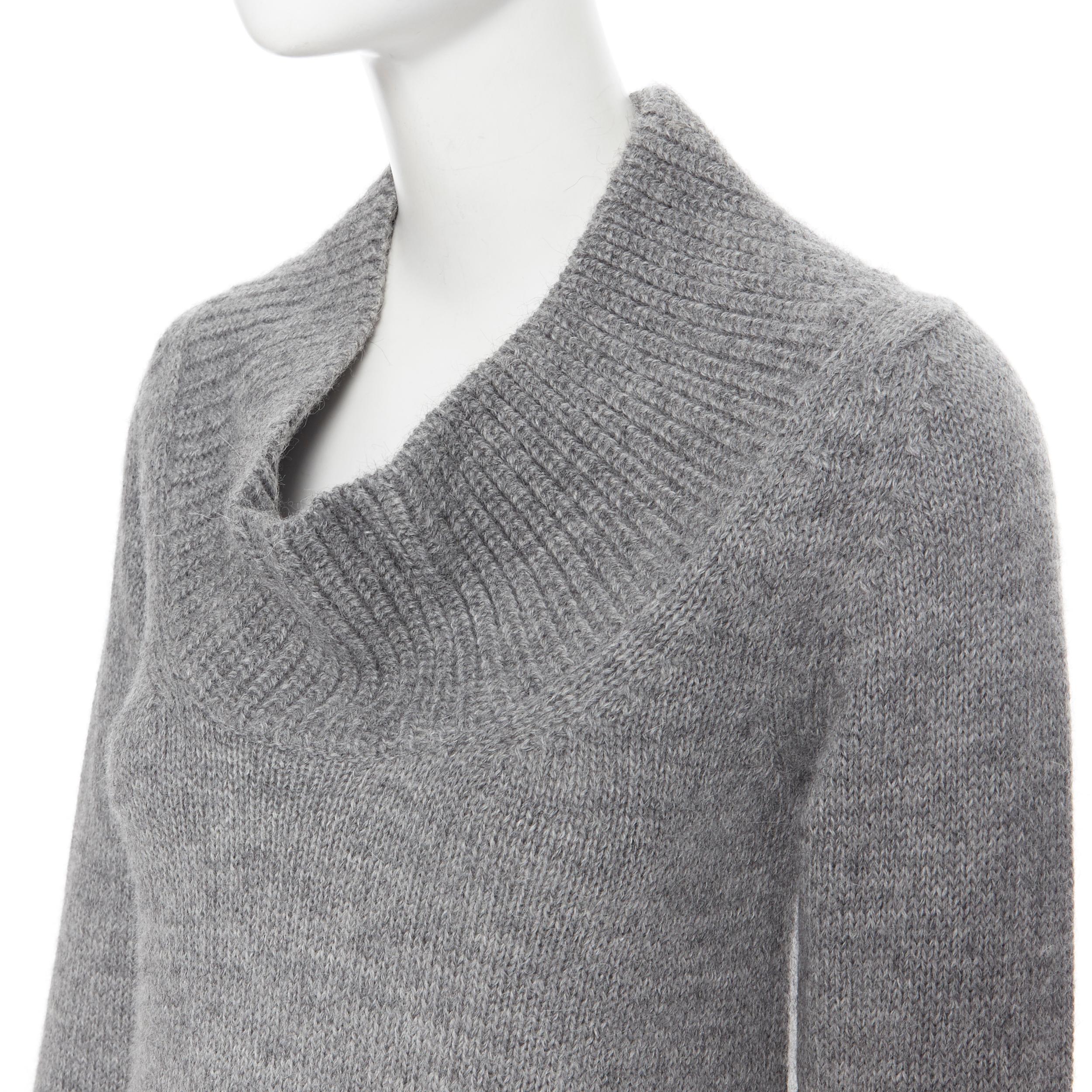 CHLOE alpaca wool grey open cowl neck long sleeve sweater dress XS
Brand: Chloe
Model Name / Style: Sweater dress
Material: Wool
Color: Grey
Pattern: Solid
Extra Detail: Ribbed open cowl neck. Long sleeve. Cowl neck neckline.
Made in: