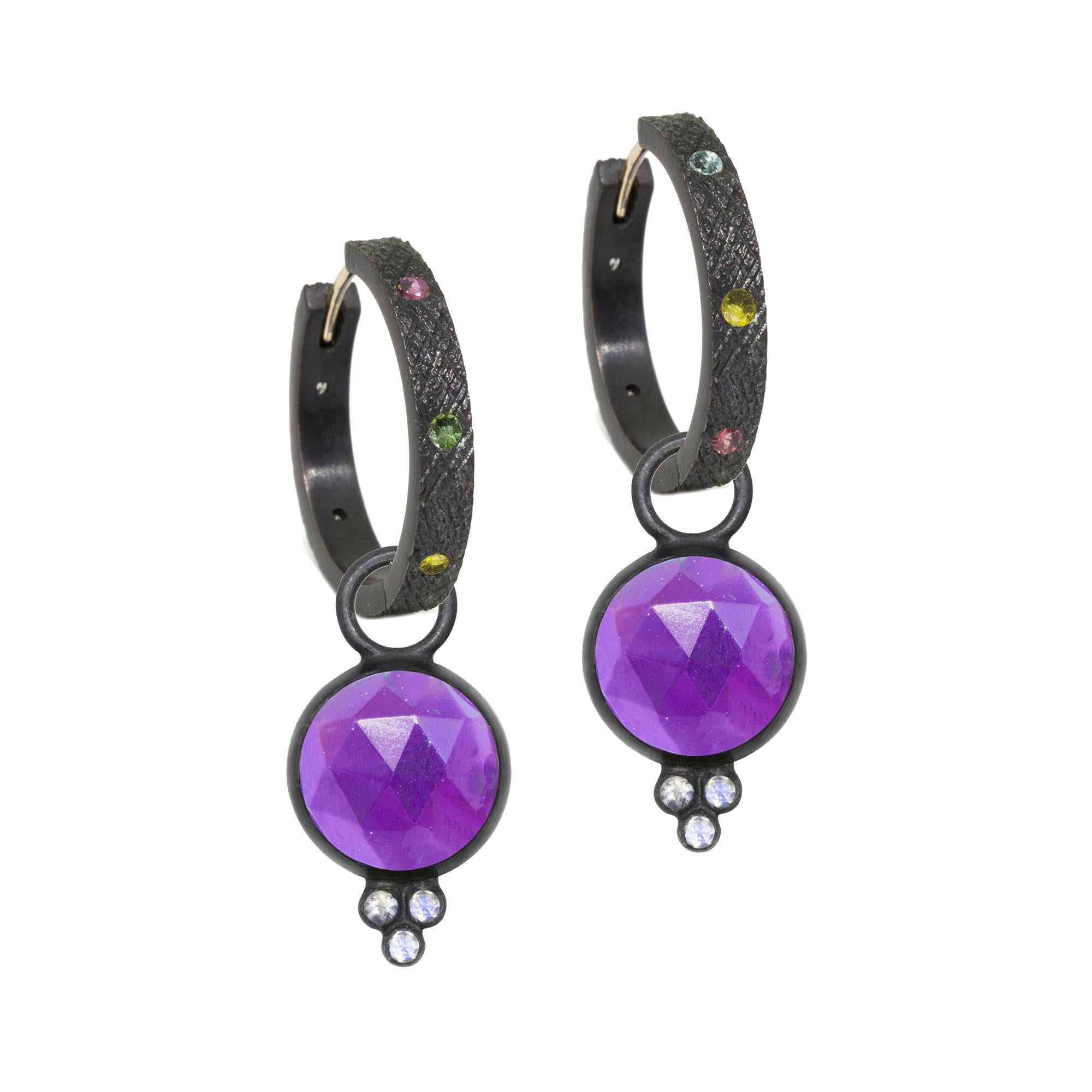 A Nina Nguyen classic to collect and treasure: Our diamond-accented Chloe Oxidized Charms are designed with faceted amethyst rimmed in blackened silver. They pair with any of our hoops and mix well with other styles.

Nina Nguyen Design's