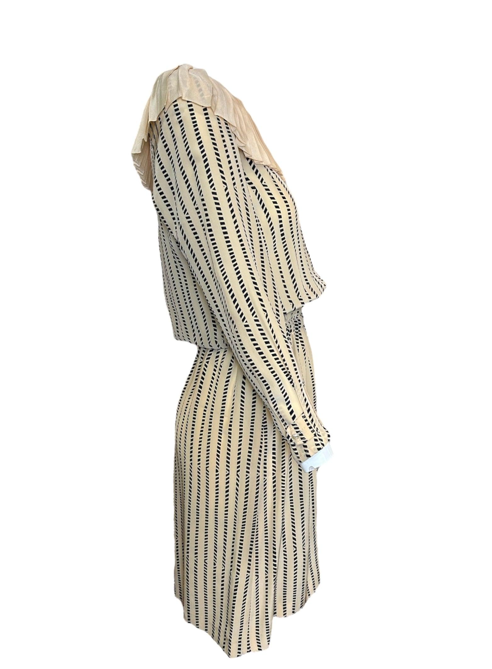 This 80's silk Karl Lagerfeld for Chloe dress is the playful, babydoll nod we love to see from the 80s. Somewhere between a luxury court jester and Baby Jane, this dress transports you to a time where high luxury and youth went hand and hand.