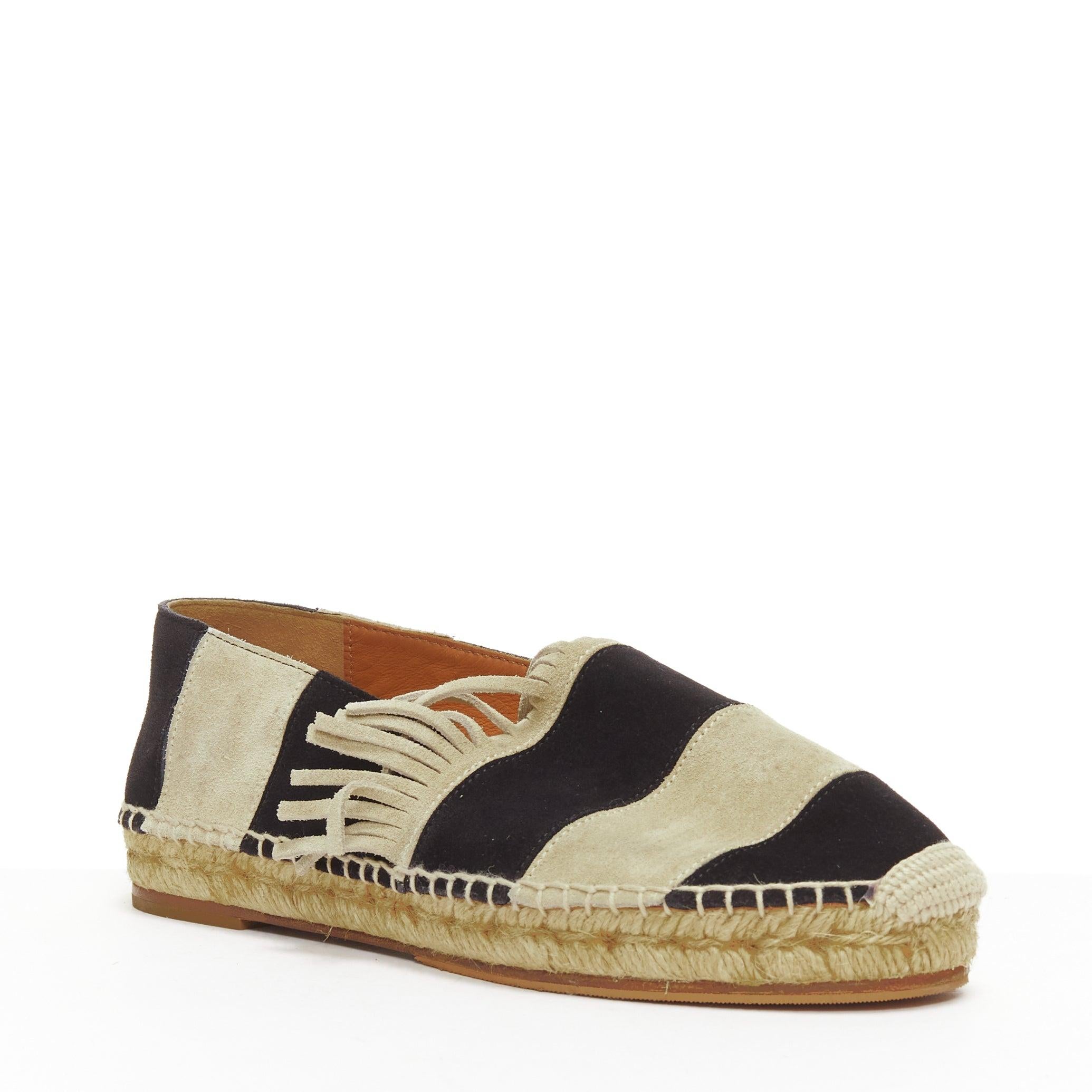 CHLOE beige black suede leather striped panels fringe slip on espadrilles EU37
Reference: NILI/A00063
Brand: Chloe
Material: Suede
Color: Black, Nude
Pattern: Striped
Closure: Slip On
Lining: Black Fabric
Made in: Spain

CONDITION:
Condition: Fair,