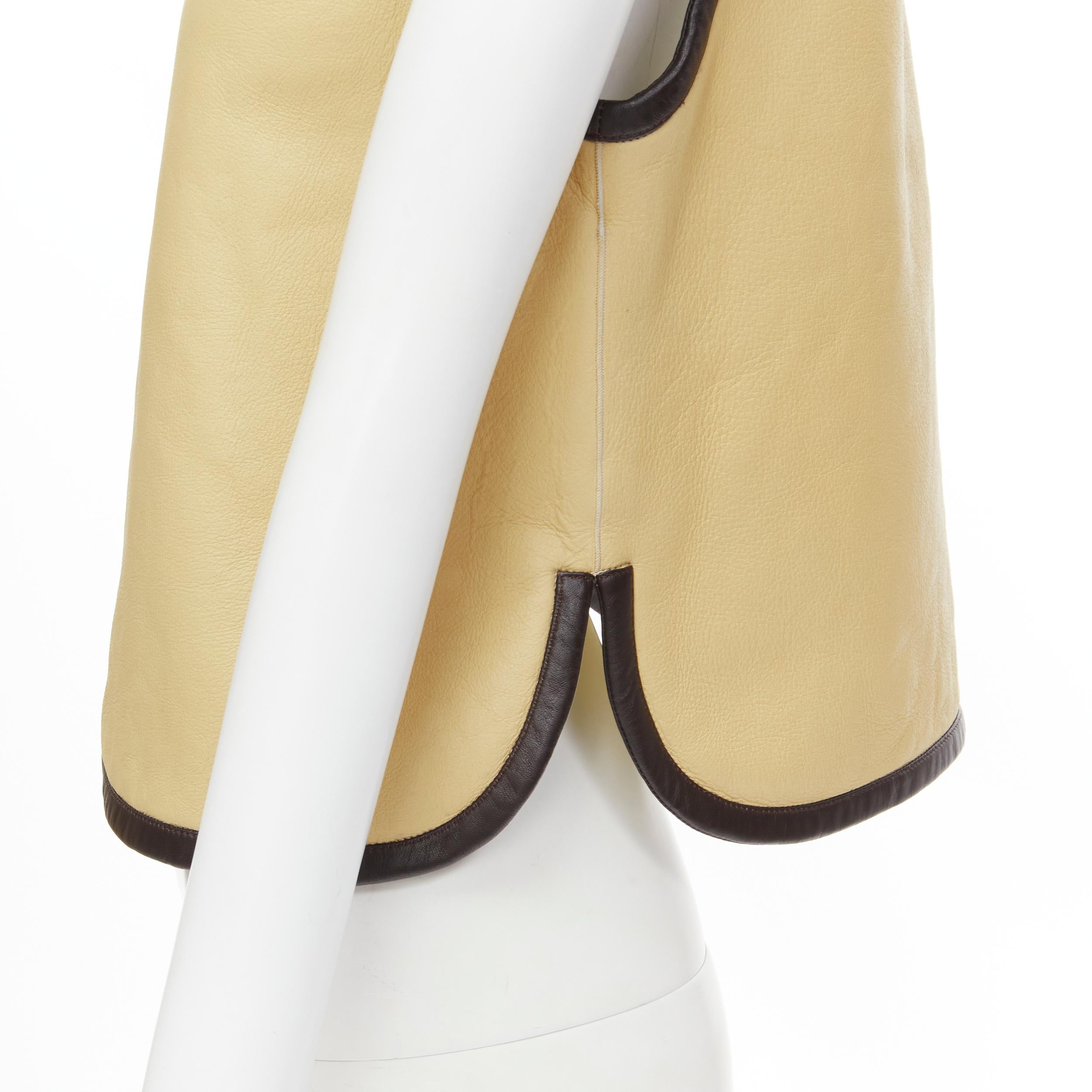 CHLOE beige brown leather colorblocked shearling lined zip vest FR34 XS 
Reference: MELK/A00142 
Brand: Chloe 
Material: Leather 
Color: Brown 
Pattern: Solid 
Closure: Zip 
Extra Detail: Full shearling lined. Chloe signed zipper. 
Made in: Italy