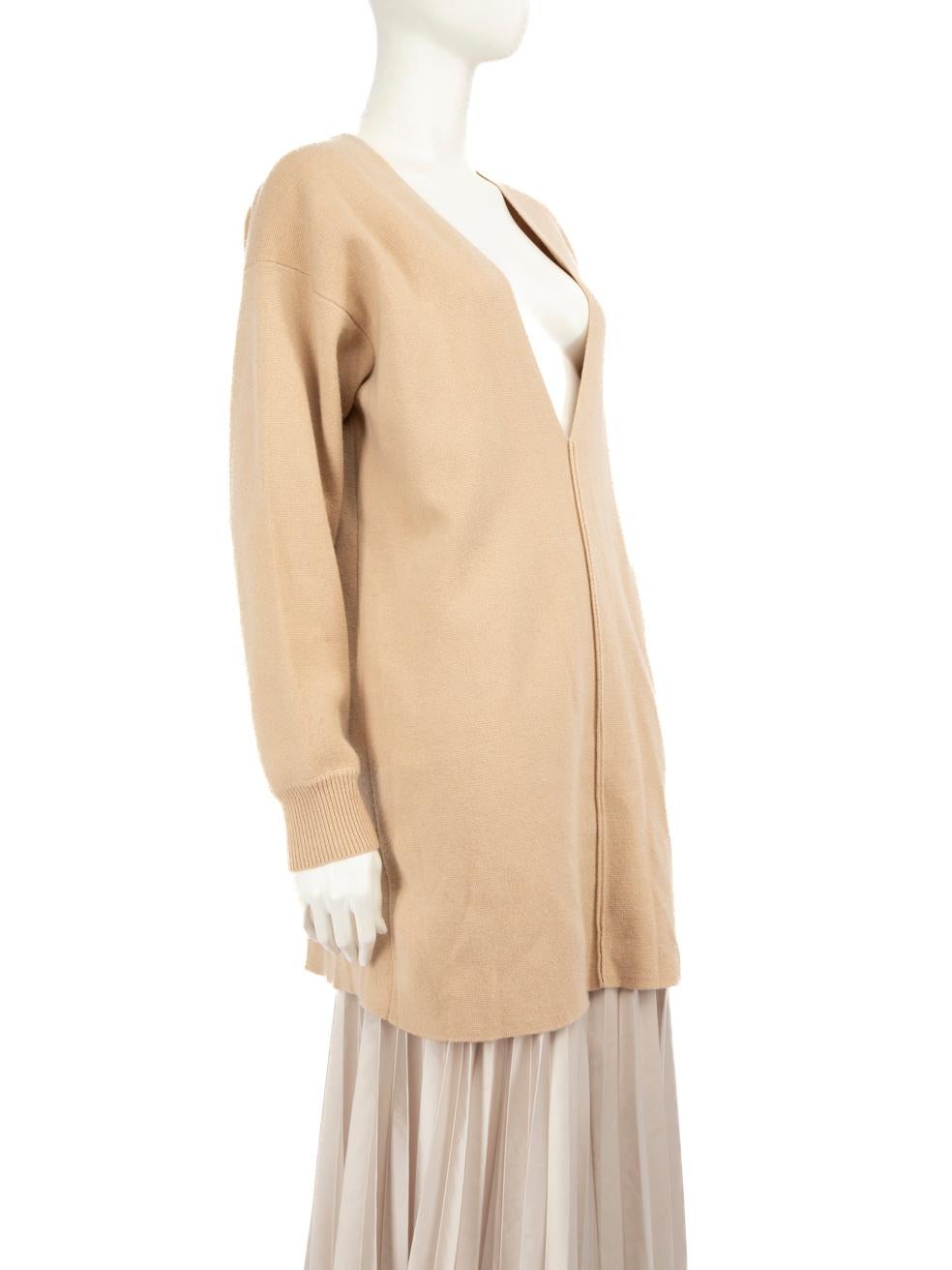 CONDITION is Very good. Hardly any visible wear to the jumper is evident on this used Chloé designer resale item.
 
 Details
 
 
 Beige
 
 Cashmere
 
 Jumper
 
 Long sleeves
 
 Stretchy
 
 V neck
 
 Ribbed trim sleeve cuffs
 
 
 
 
 
 Made in China

