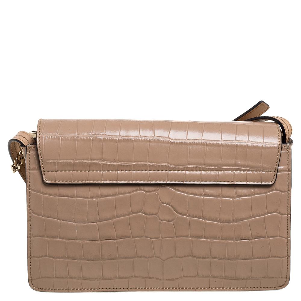 You are going to love owning this Faye shoulder bag from Chloe as it is well-made and brimming with luxury. The bag has been crafted from croc-embossed leather and designed with a flap with a chain detail and well-sized suede compartments for your