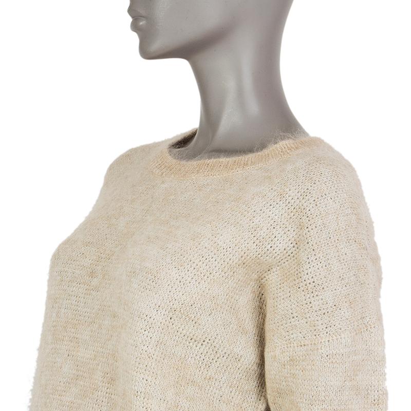 100% authentic Chloé knitted sweater in neutral, beige, and grey mohair (35%), wool (26%), alpaca (22%), and nylon (17%) with 3/4-sleeves. Unlined. Has been worn and is in excellent condition.

Measurements
Tag Size	XS
Size	XS
Shoulder Width	56cm