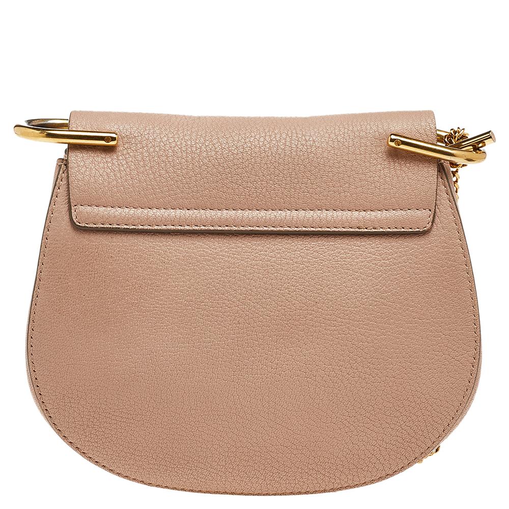 One of the most recognizable bags in the luxury world, Chloé's Drew bag was part of the label's fall/winter 2014 collection. It carries a distinct shape and minimal style detailing. This shoulder bag has been meticulously crafted from leather and