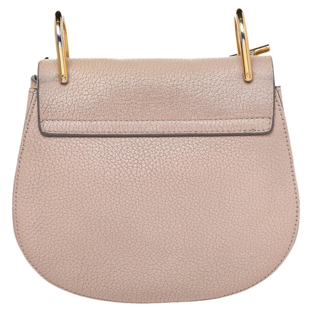 One of the most recognizable bags in the luxury world, Chloé's Drew bag was part of the label's fall/winter 2014 collection. It carries a distinct shape and minimal style detailing. This shoulder bag has been meticulously crafted from leather and