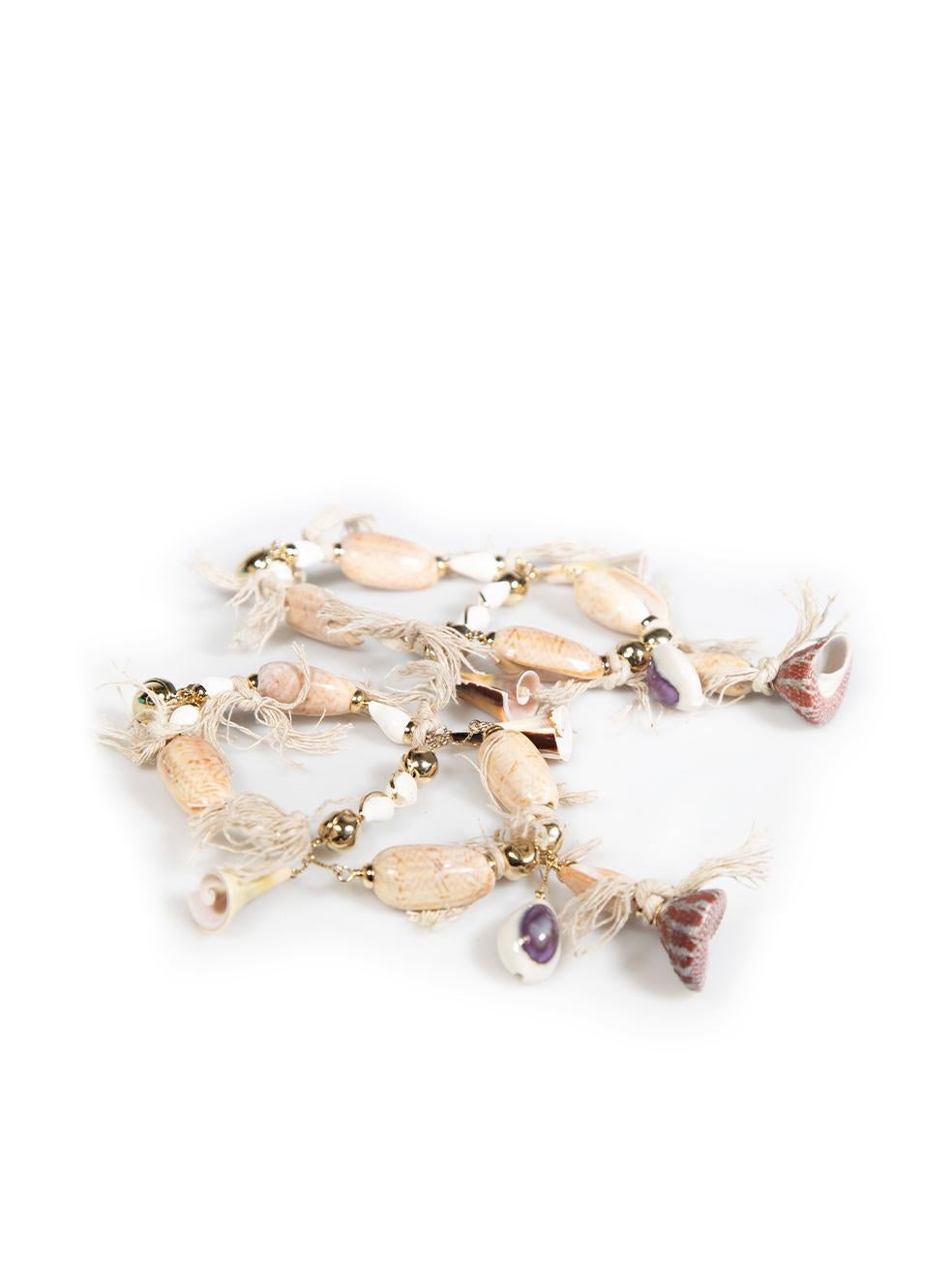 CONDITION is Never worn, with tags. No visible wear to earrings is evident on this new Chloé designer resale item. There is a gemstone missing from a lower shell due to poor storage.
 
Details
Beige
Seashell
Earrings
Gold beaded detail
 
Made in