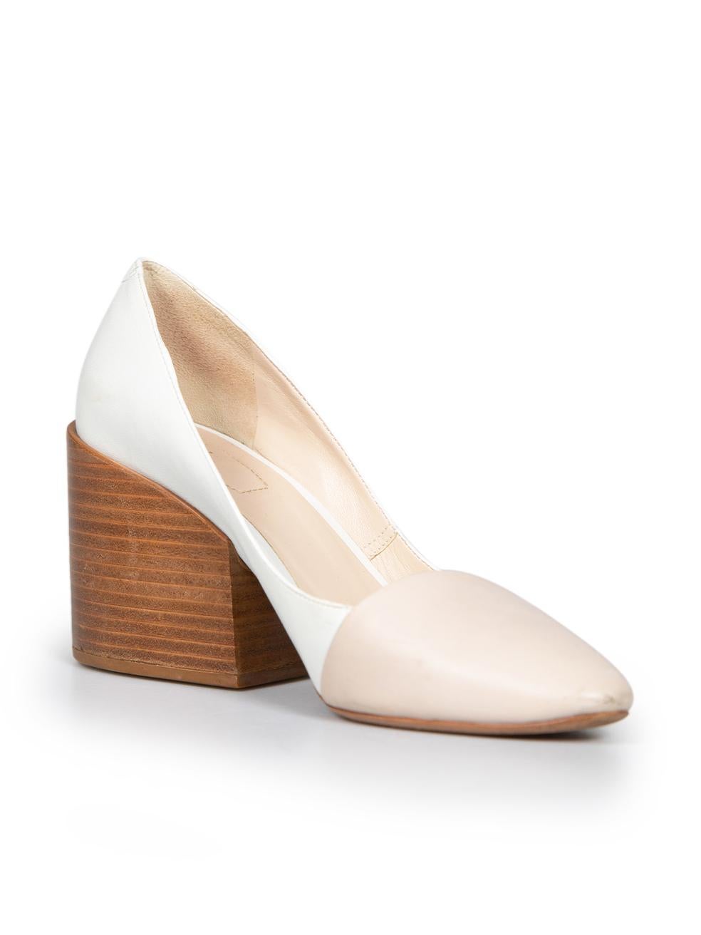 CONDITION is Good. Minor wear to heels is evident. Light wear to leather outer at toe edge, sides and insoles on this used Chloé designer resale item.
 
 
 
 Details
 
 
 Beige and white
 
 Leather
 
 Pumps
 
 Almond toe
 
 Wooden block heel
 
 Mid