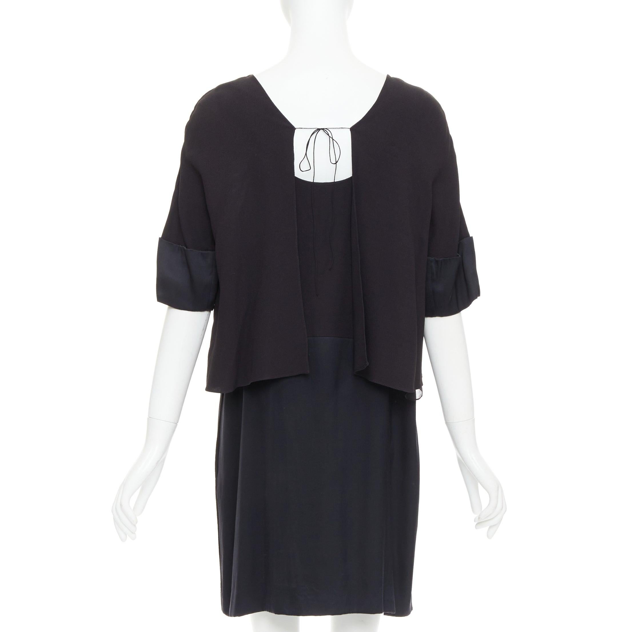 CHLOE black 100% silk crepe satin contrast cape back dress FR42 XL
Reference: CC/A00495
Brand: Chloe
Material: Silk
Color: Black
Pattern: Solid
Closure: Self Tie
Lining: Black Silk
Extra Details: Layered bodice with tie cape at top.
Made in: