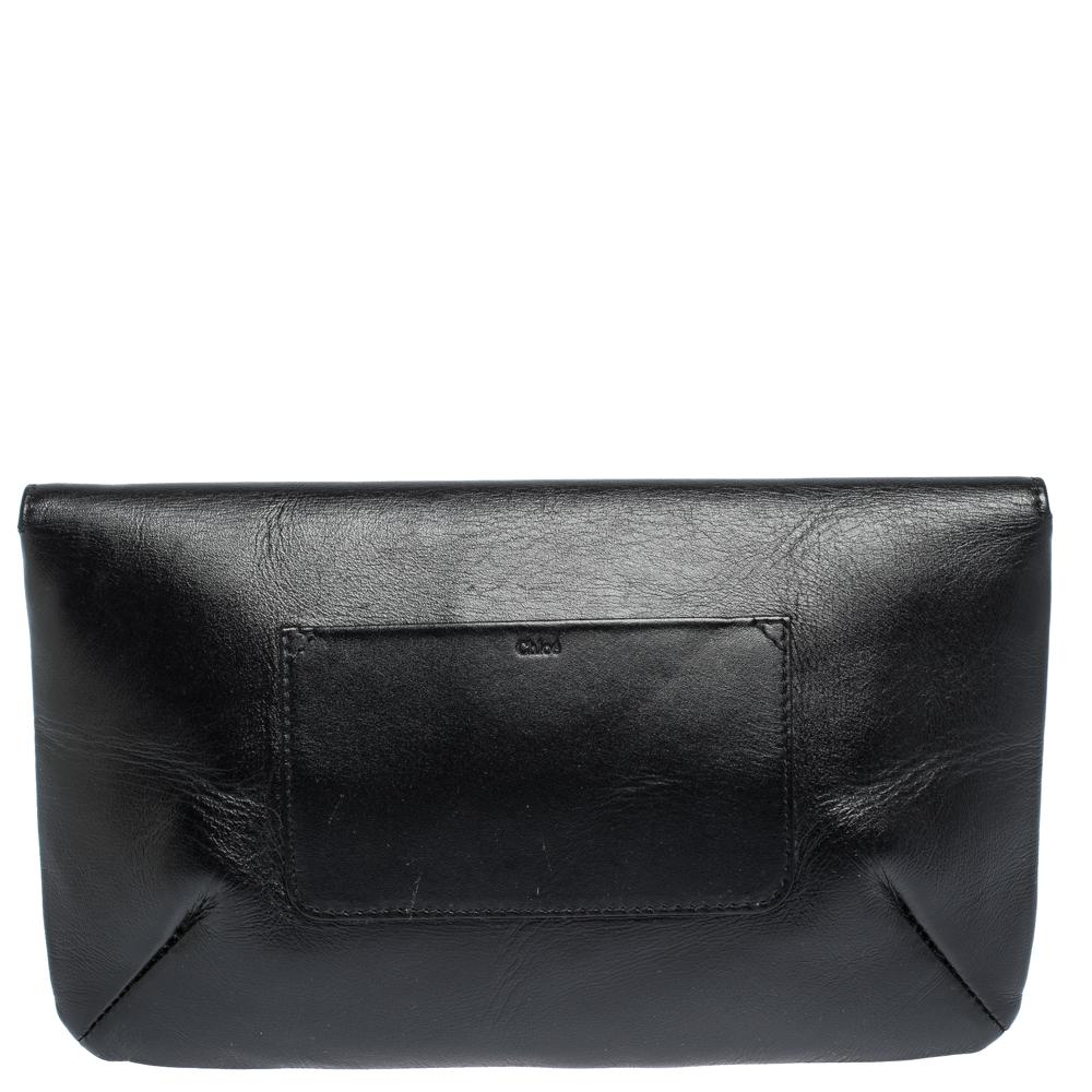 Every feature on this Chloe clutch is delighting which makes the creation worthy of being owned. It has been crafted from leather and styled with an oversized bow on the flap. The clutch has a leather interior for your essentials.

Includes: