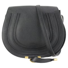 Chlo Sac à bandoulière rond Marcie en cuir de veau noir de taille moyenne  20cl82s