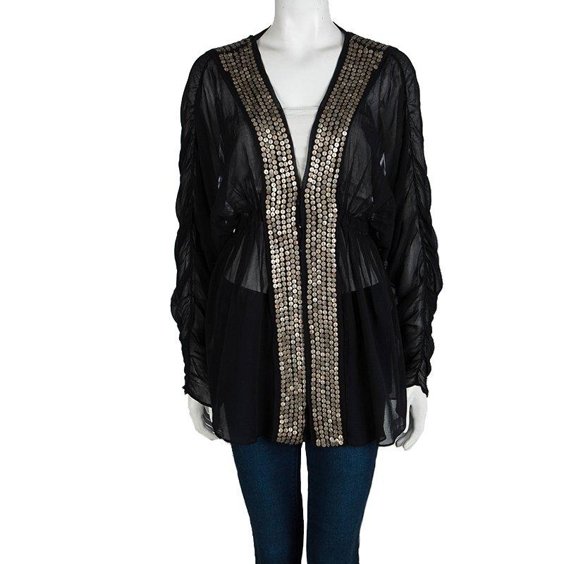 Comfy and easy to wear, this Chloe tunic will be a fabulous addition to your closet. Made in France using cotton, this tunic has a sheer style with gorgeous embellishments on the front. Team this piece with skinny jeans and knee boots for an edgy