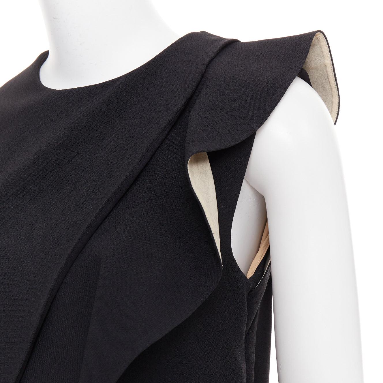 CHLOE black crepe cream silk trim asymmetric ruffle shift dress FR36 S
Reference: NKLL/A00524
Brand: Chloe
Material: Acetate, Blend
Color: Black, Nude
Pattern: Solid
Closure: Zip
Lining: Nude Silk
Made in: France

CONDITION:
Condition: Very good,