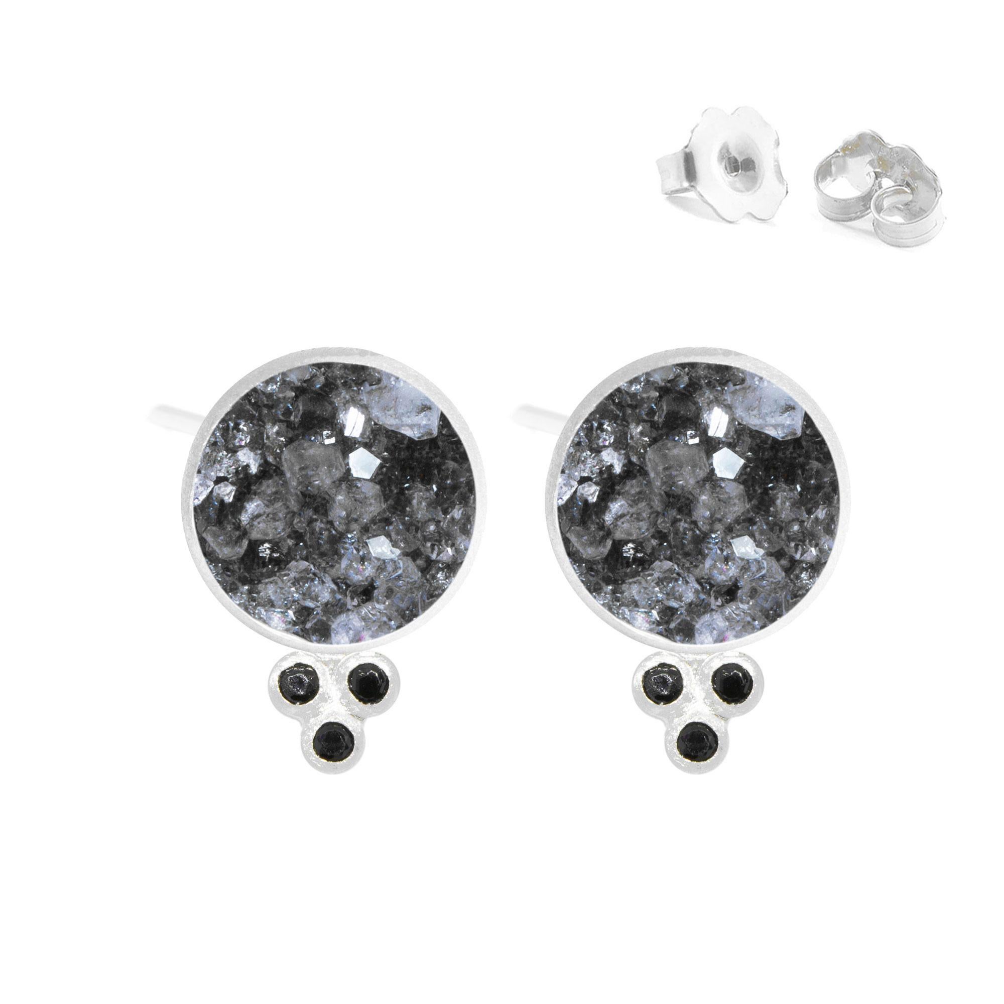 A Nina Nguyen classic: Our Chloe Silver Studs are designed with black druzy rimmed in silver, and accented with gemstones for some extra sparkle.
Nina Nguyen Design's patent-pending earrings have an element on the back of the stud or charm to allow