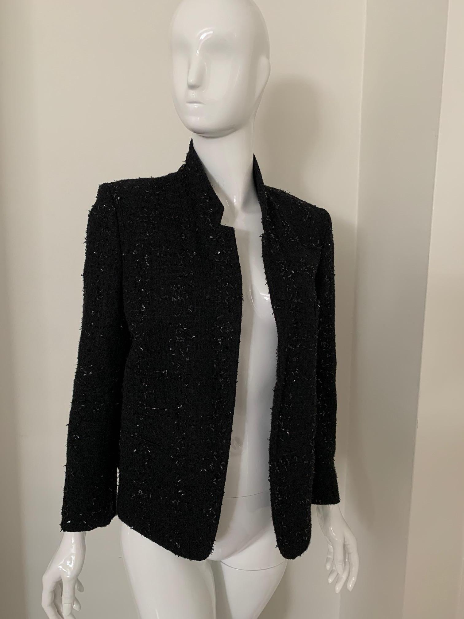 Black Chloe Open Front Blazer. 
Hits at hip and wrist. 
Small Collar that can be flipped up and turned down. 
Size 38 
Great Condition. No sign of wear. 
Perfect with jeans or over a dress for an extra layer. A very versatile, classic piece. 
