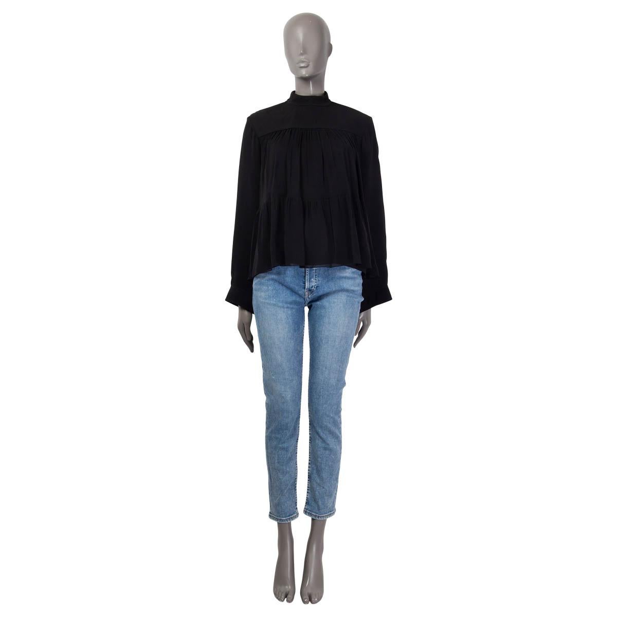 100% authentic Chloé stand ruched up collar blouse in black acetate (57%), polyamide (22%) and silk (21%). Features long sleeves and opens with a zipper on the back. Lined in black silk (68%). Has been worn and is in excellent
