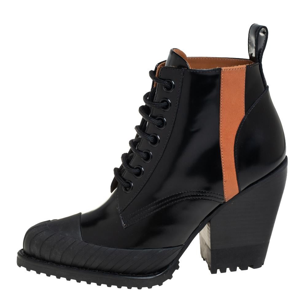 Black boots are a must in every fashionista's wardrobe. Chloé introduces a gorgeous pair of ankle boots, crafted in a combination of leather and rubber, establishing a high-end diva look. The pair features 10.5 cm heels with lace-ups on the vamps
