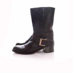 Chloe, black leather biker boots with buckle.